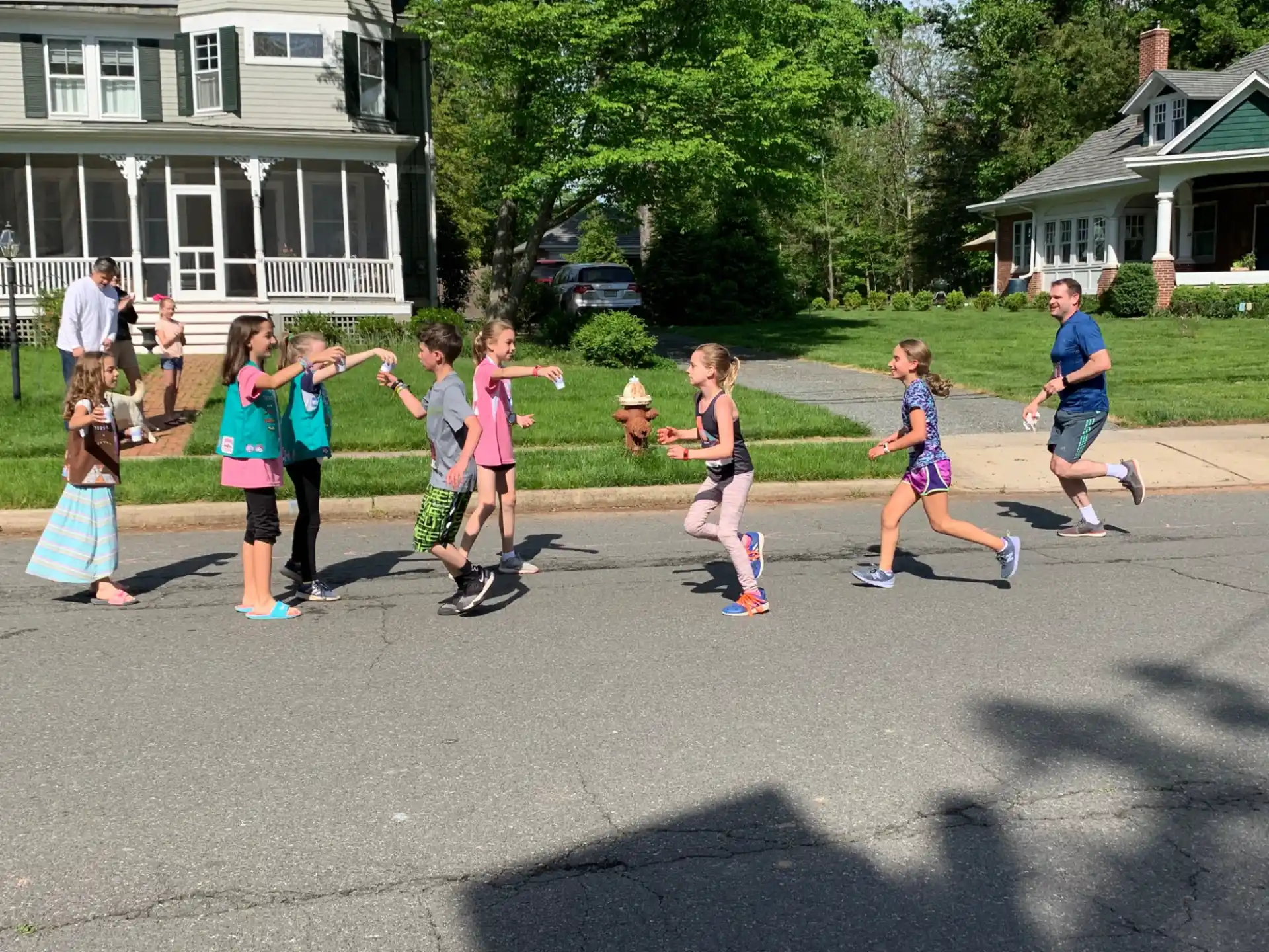 a group of people playing in a street