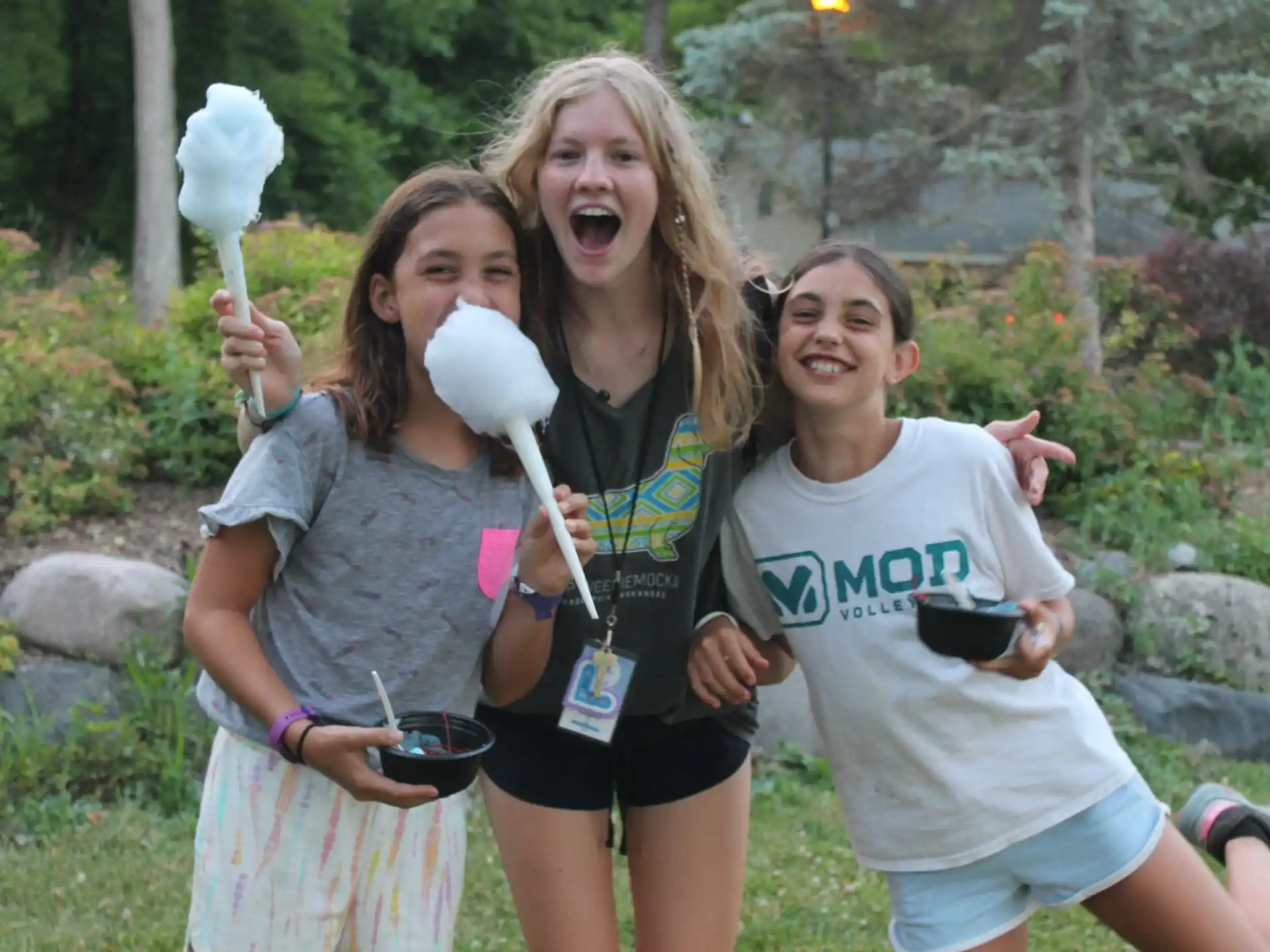 a group of girls holding a bird