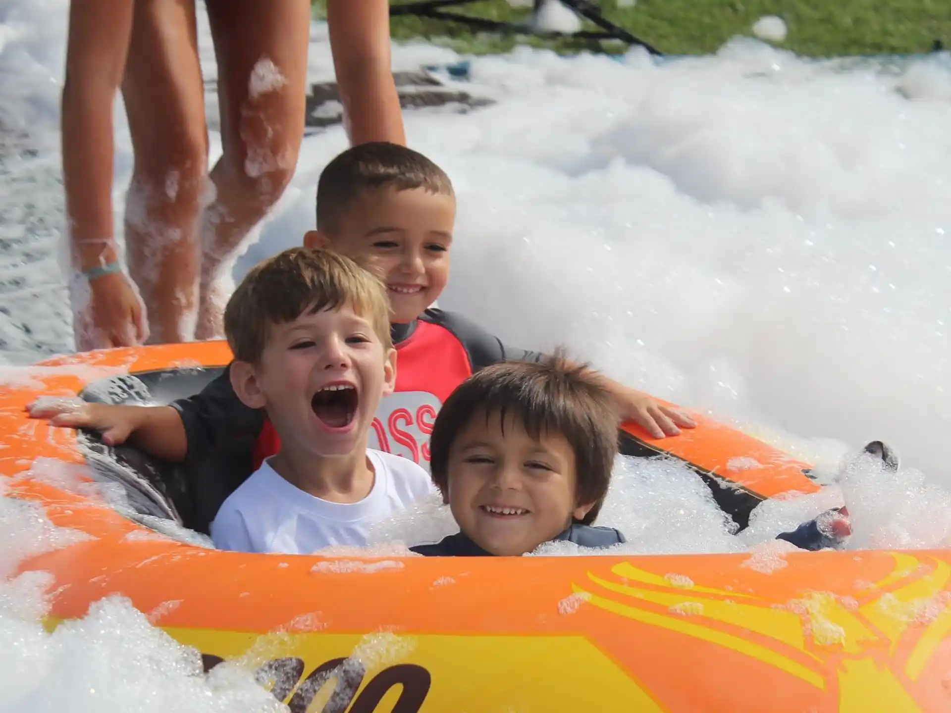 a group of kids in a pool