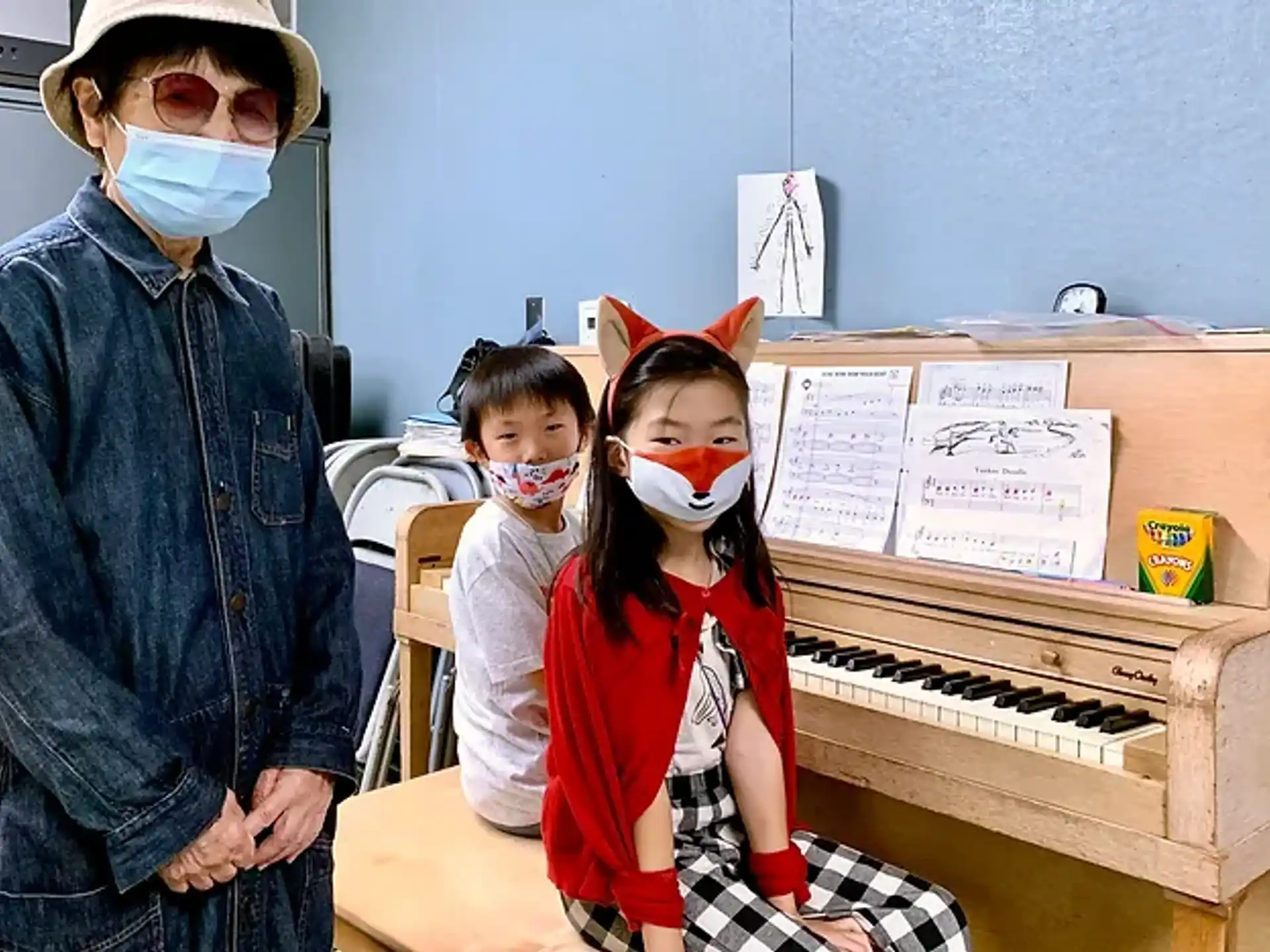 a group of kids wearing masks