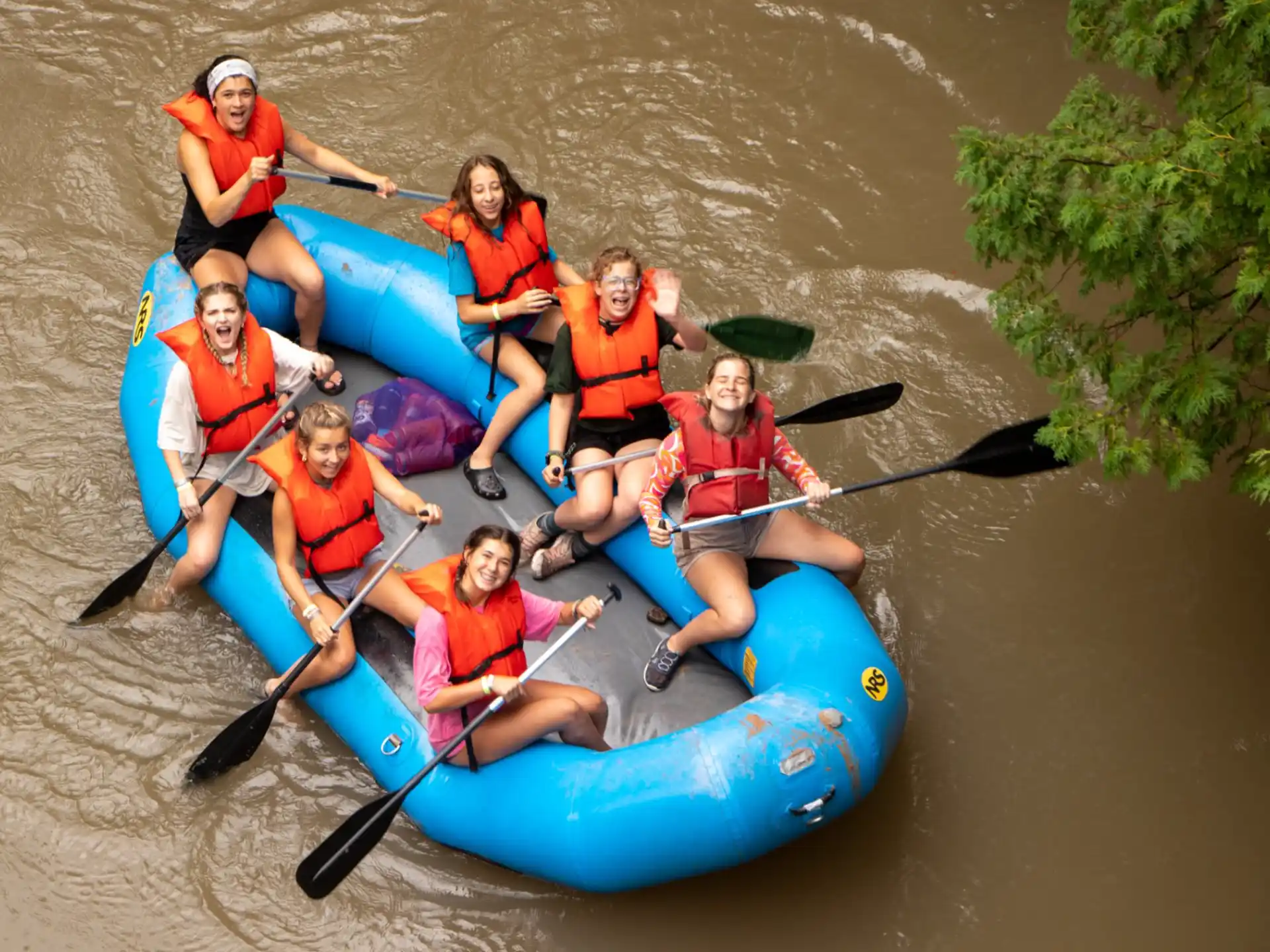 a group of people in a raft