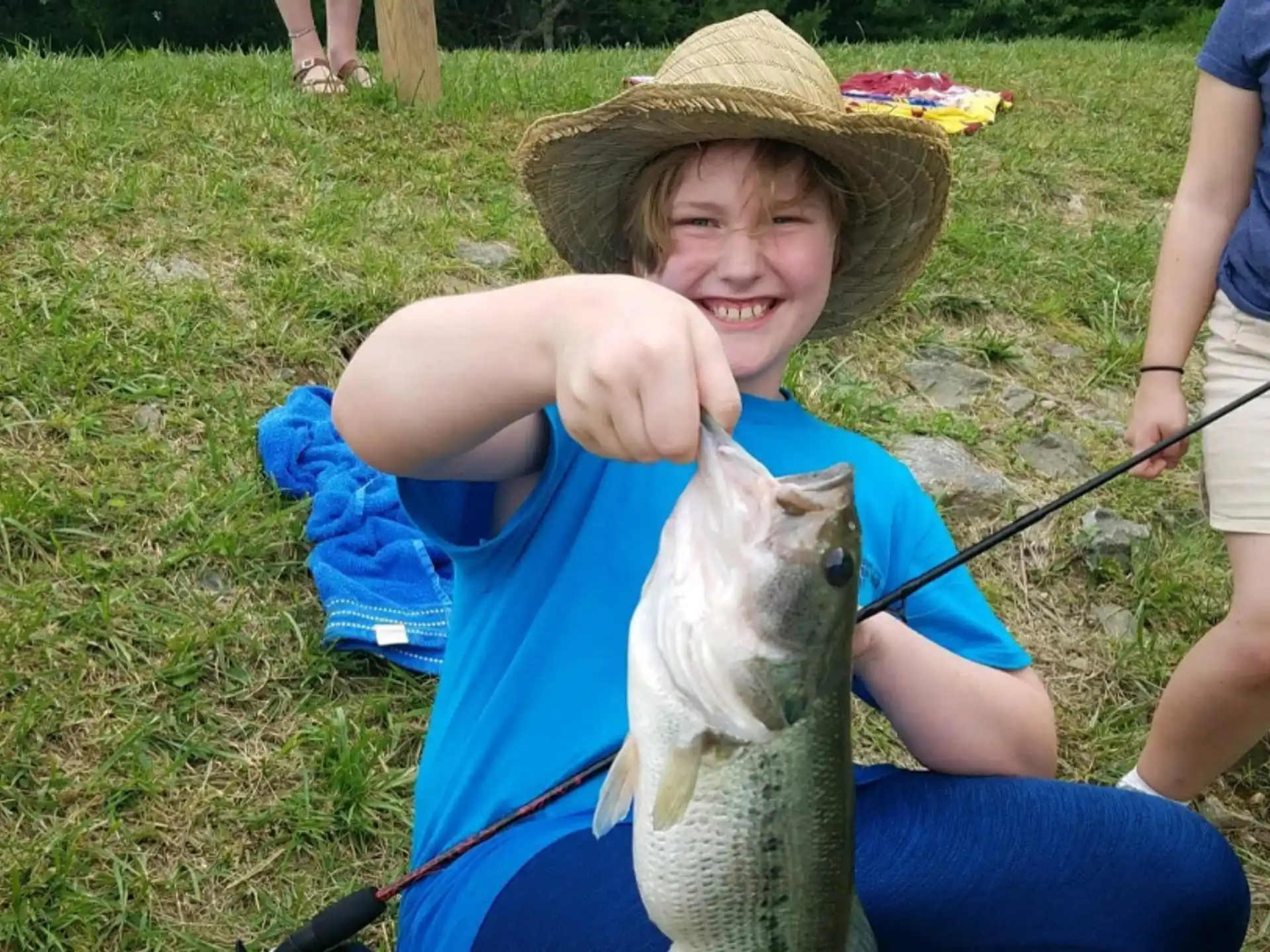 a boy holding a rabbit