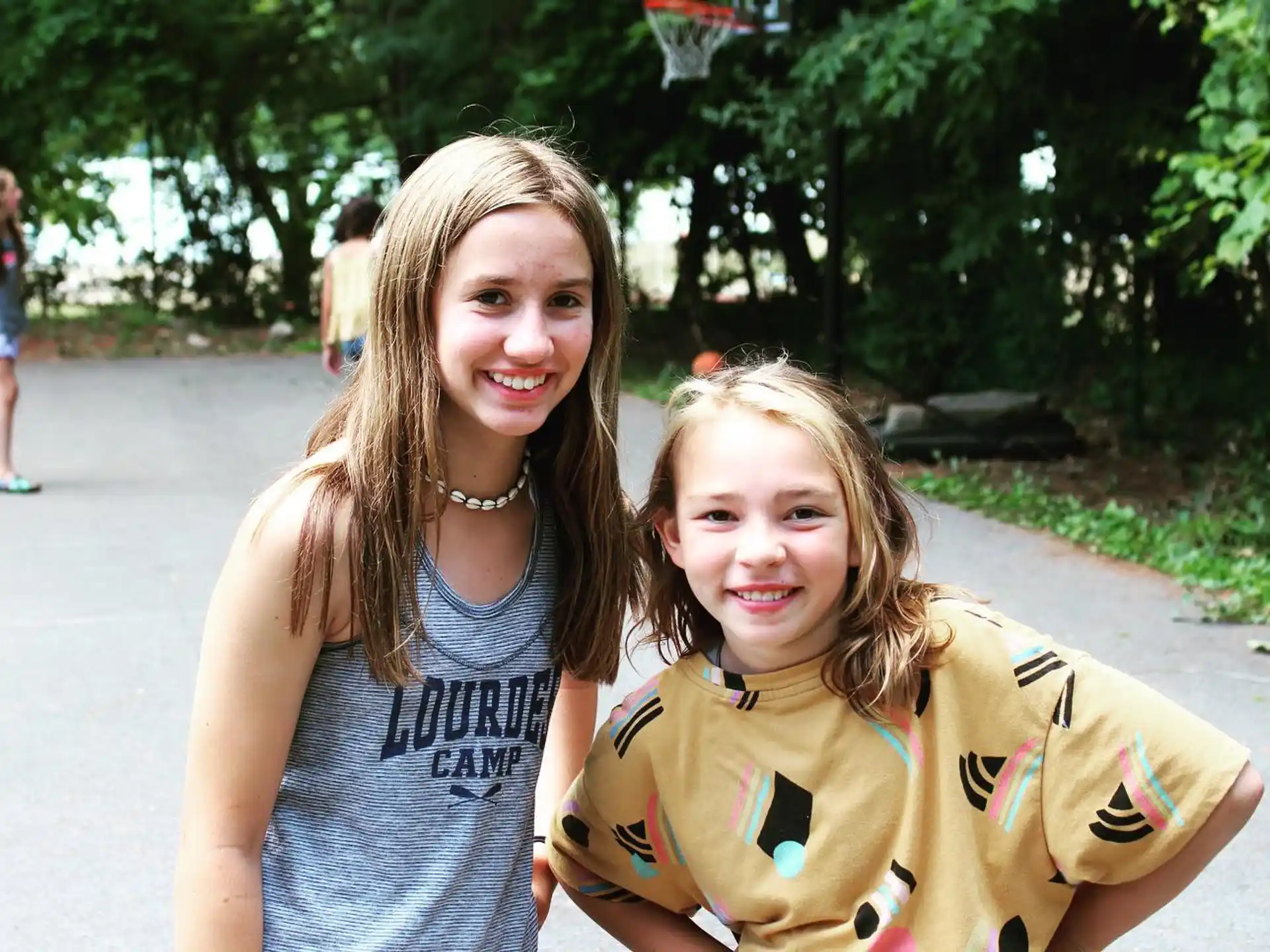 a person and a girl posing for a picture