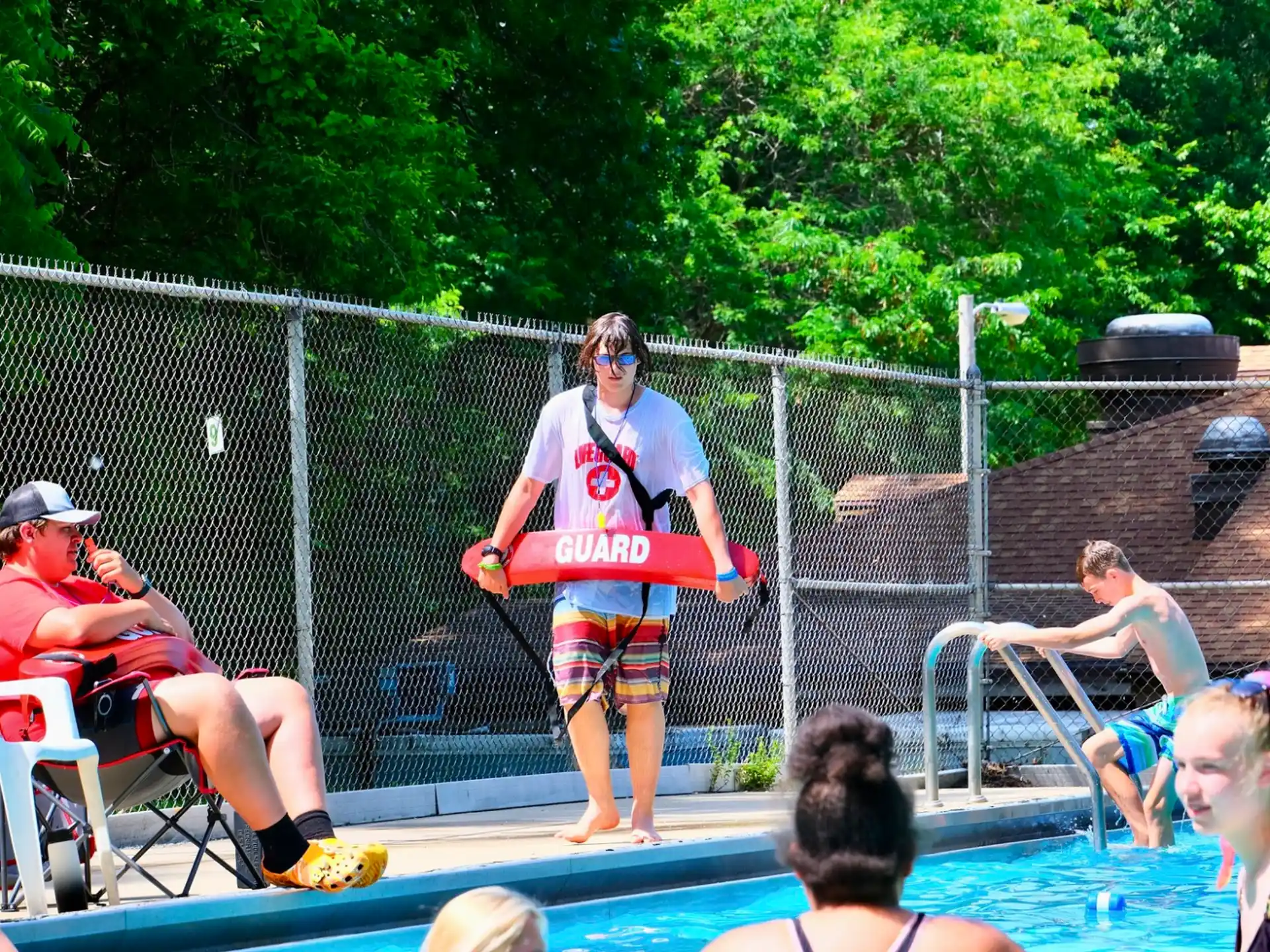 a person standing on a pool