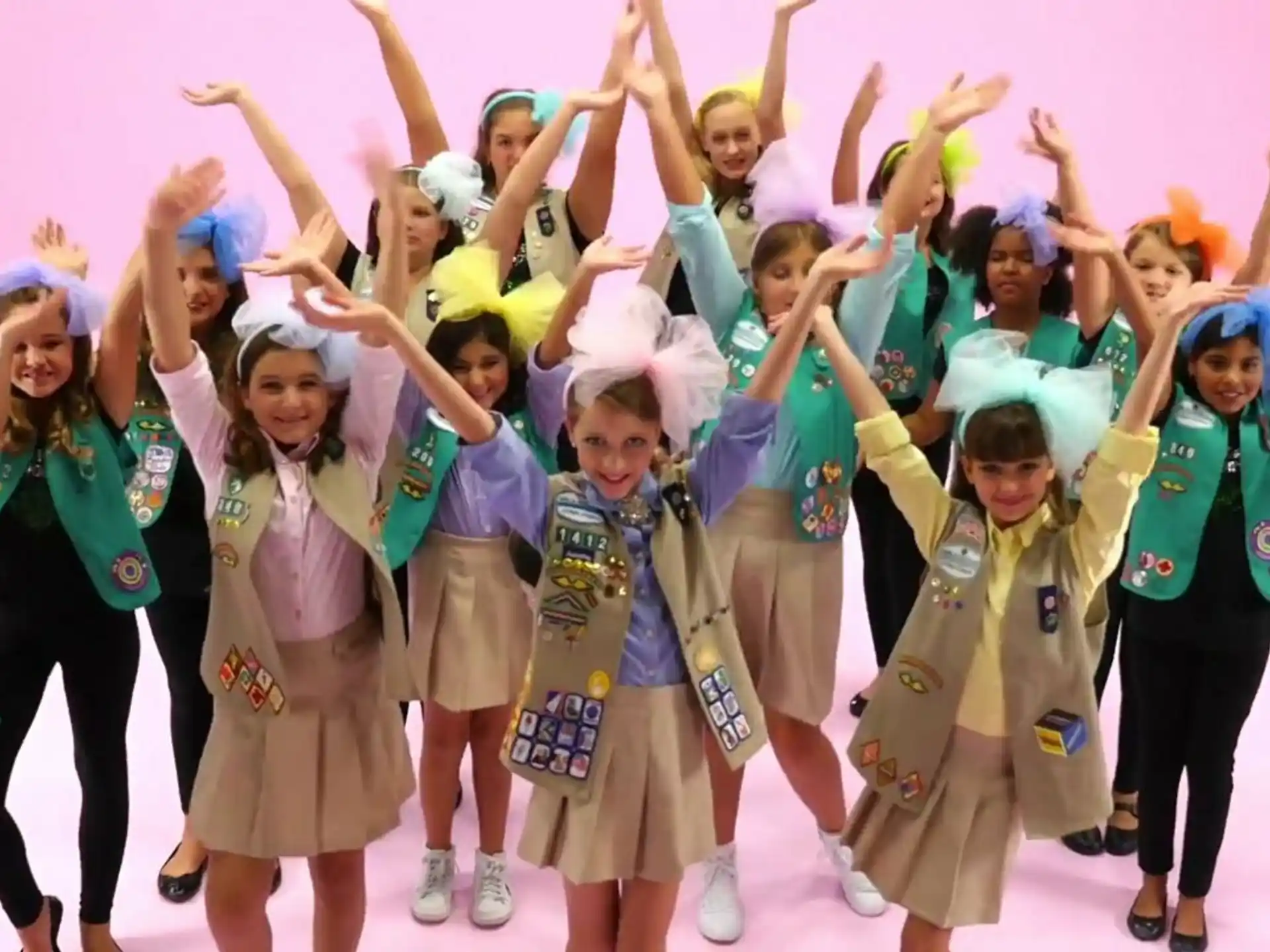 a group of girls posing for a photo