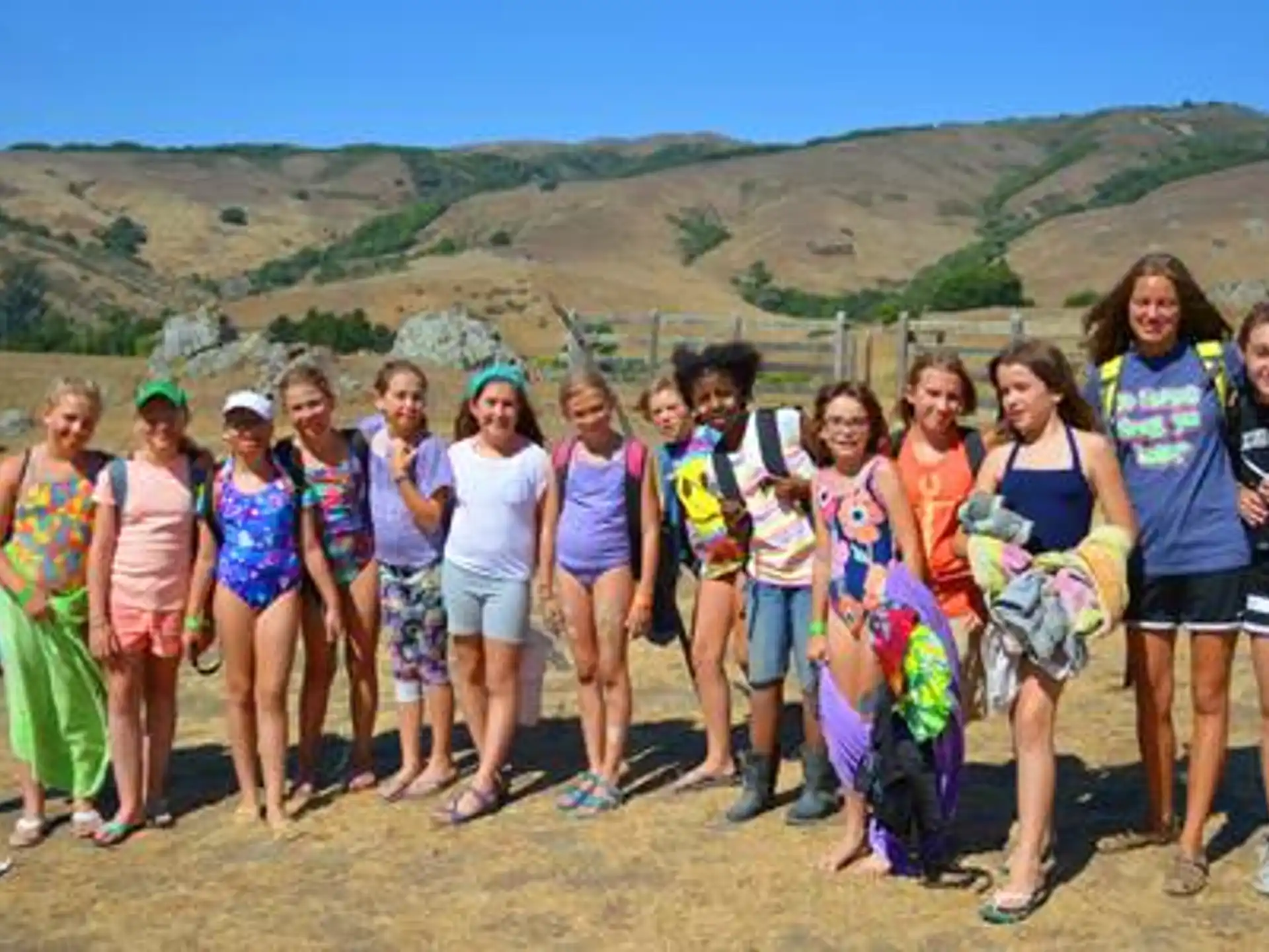 a group of people posing for a photo