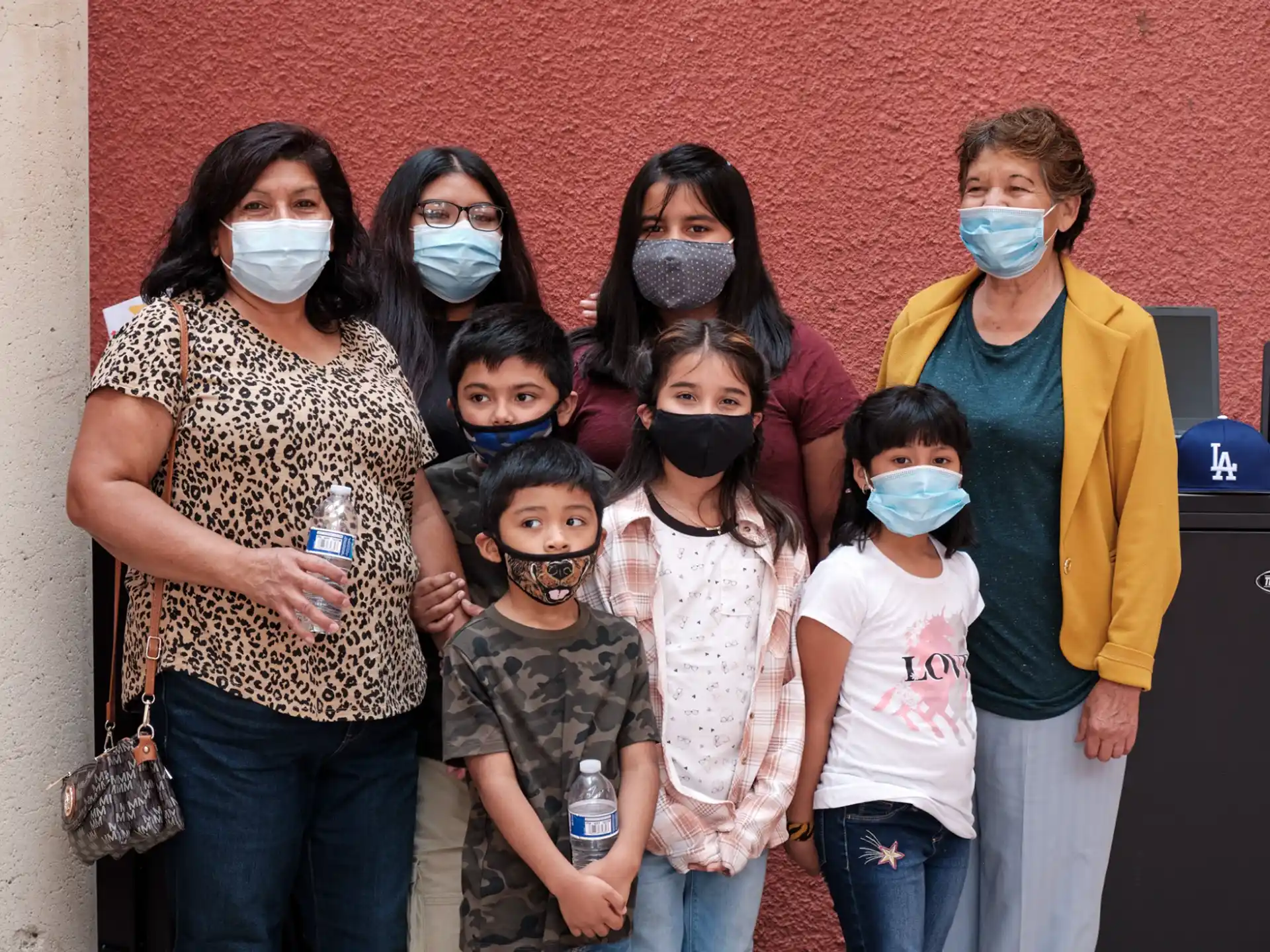 a group of people wearing face masks