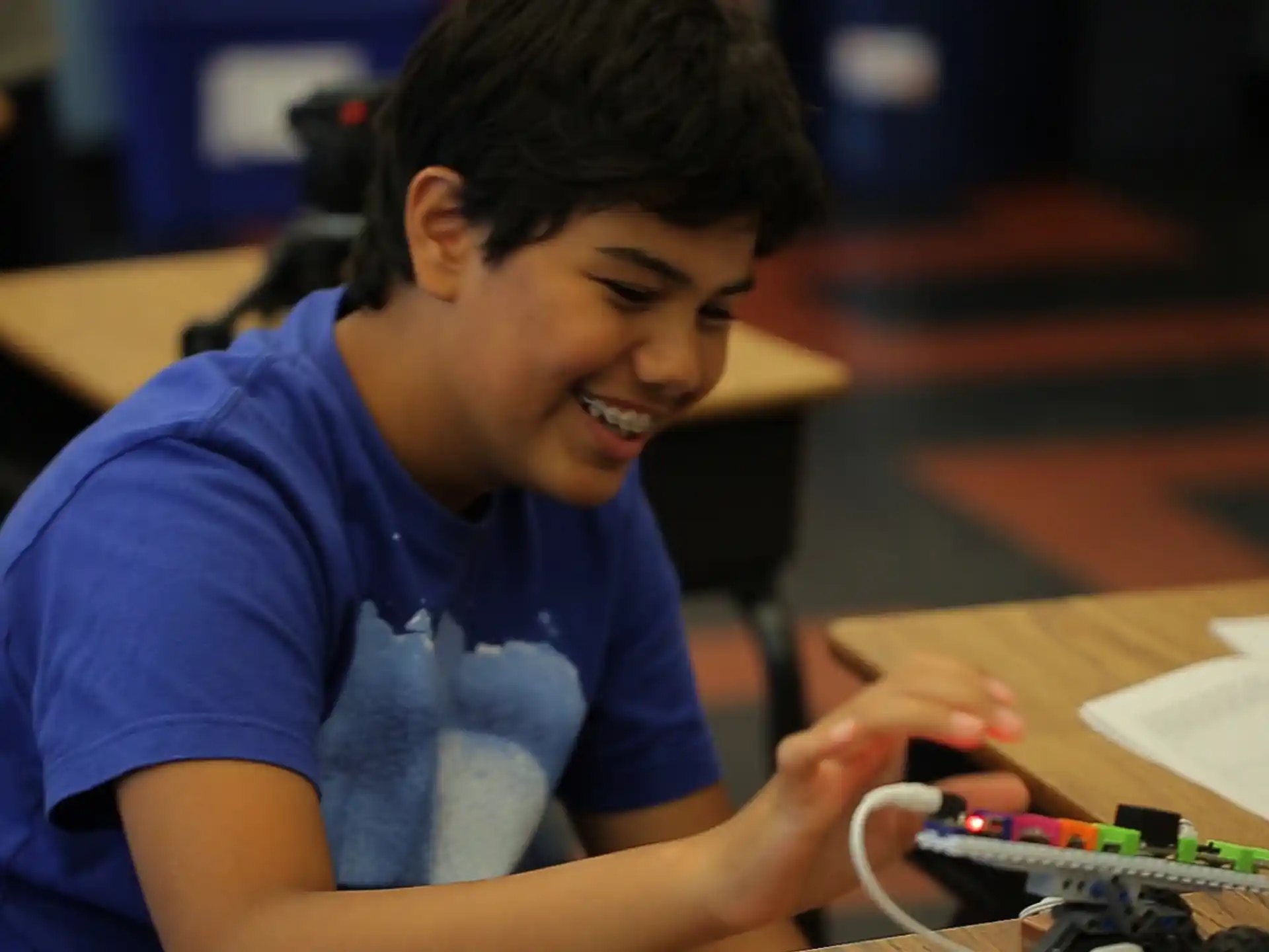 a person smiling and playing a game