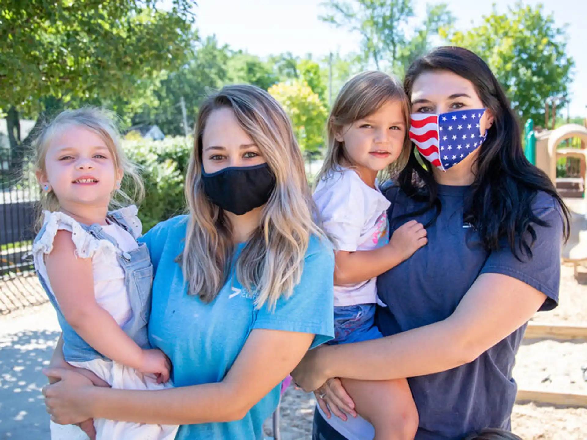 a group of children with painted faces