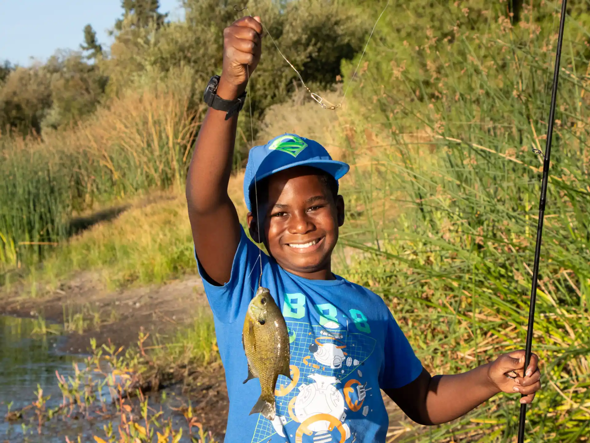 a person holding a fish