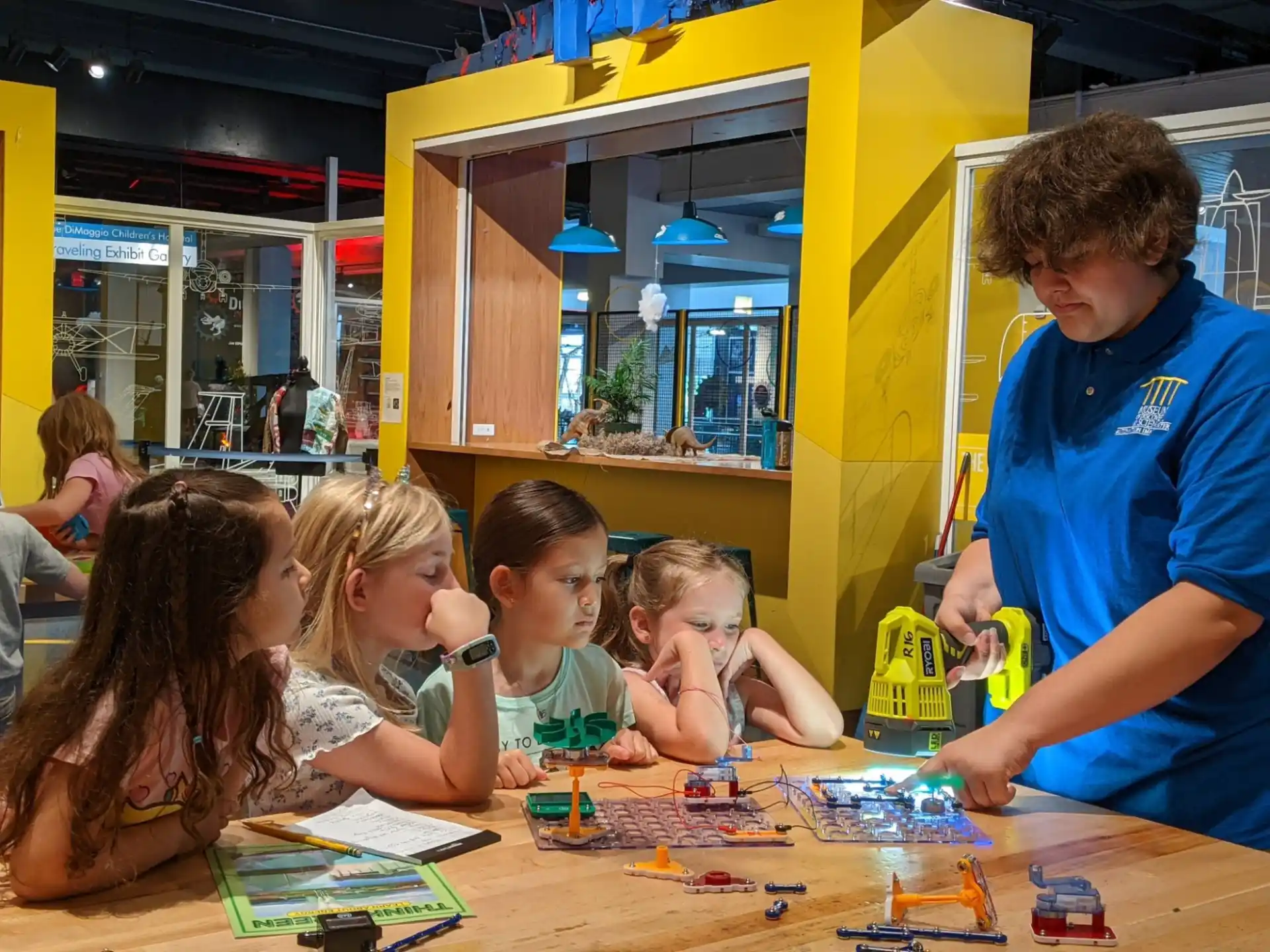 a group of children playing with toys