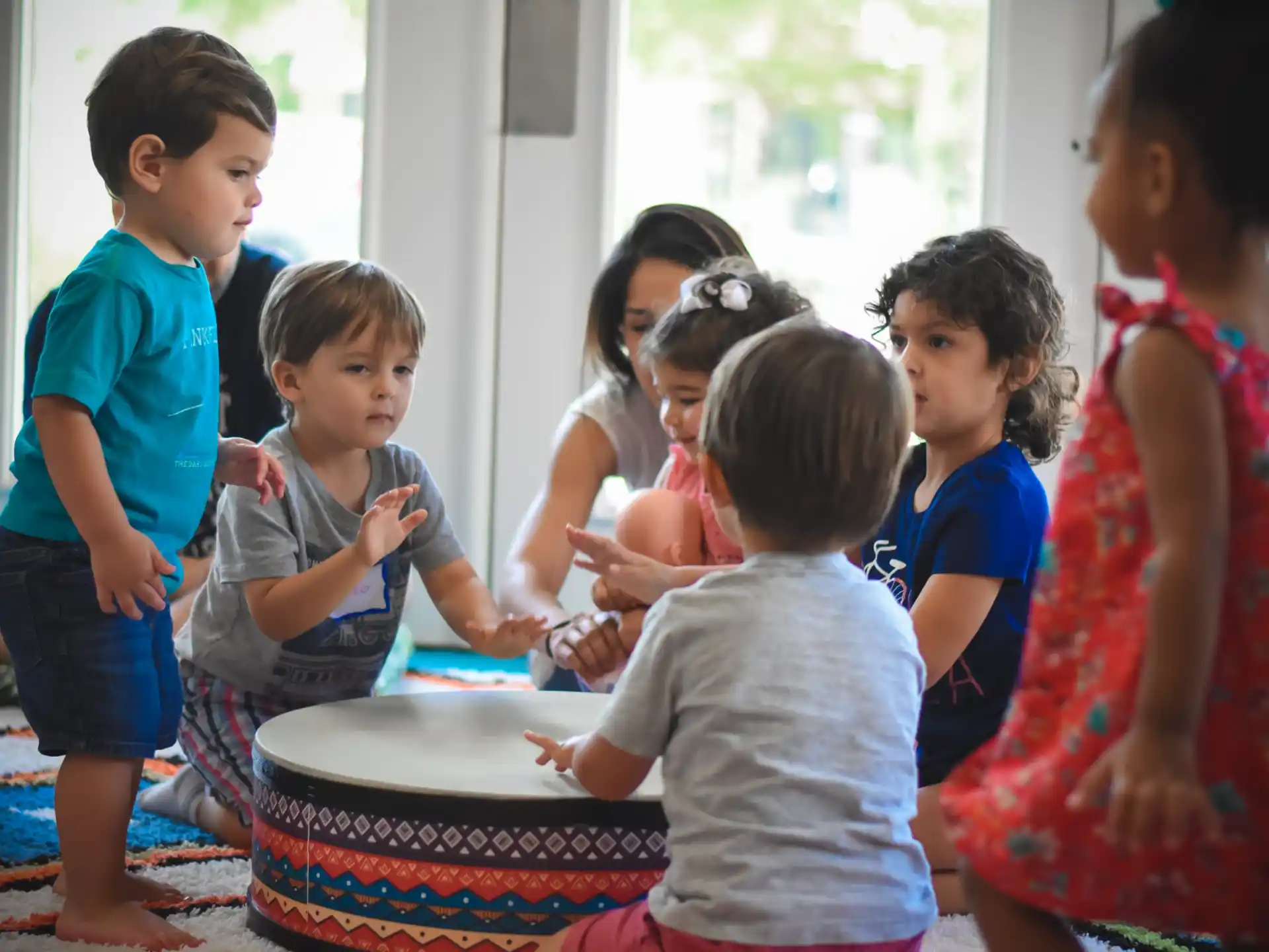 a group of children around a table