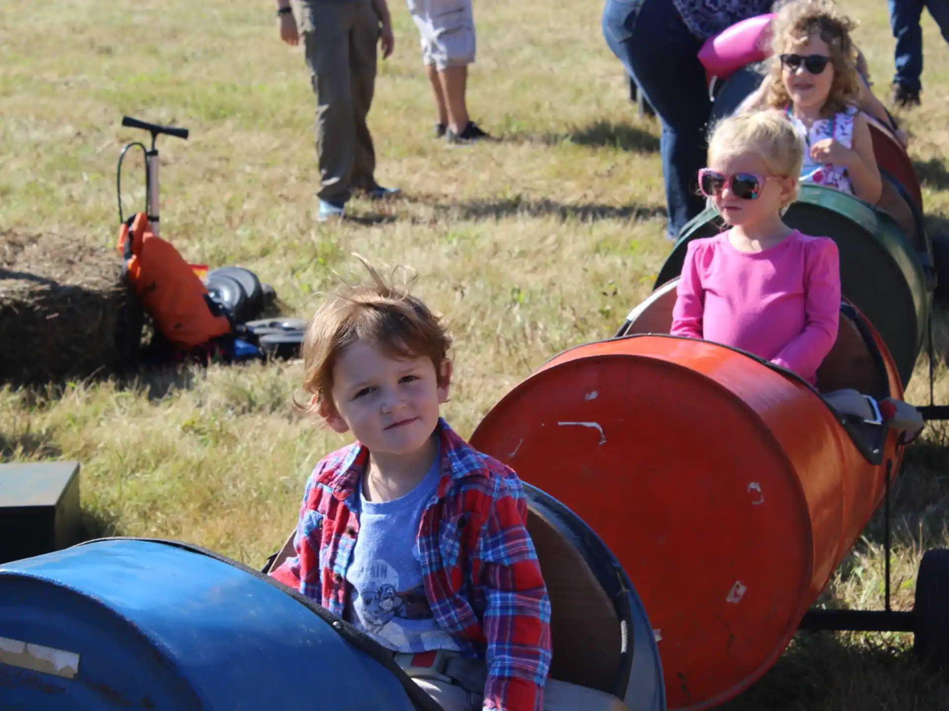 a group of children in a wagon