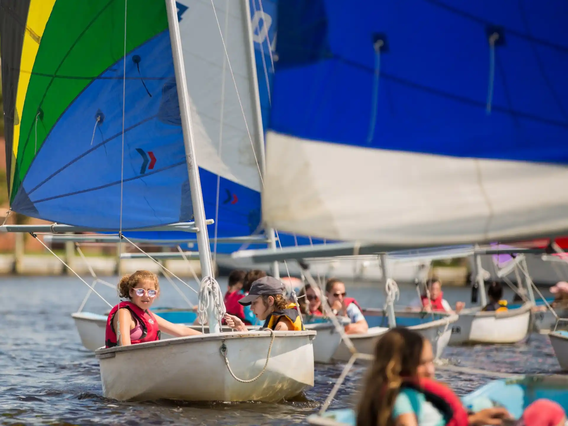 a group of people on a sailboat