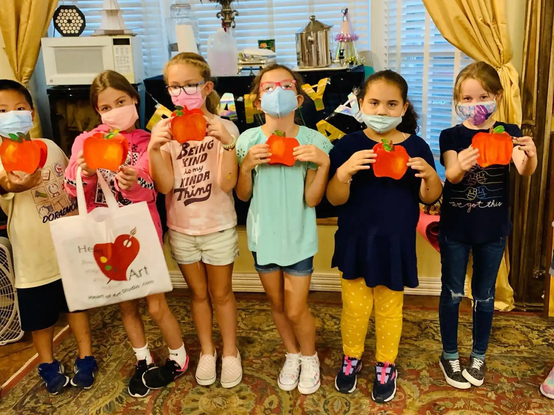 a group of children wearing clothing