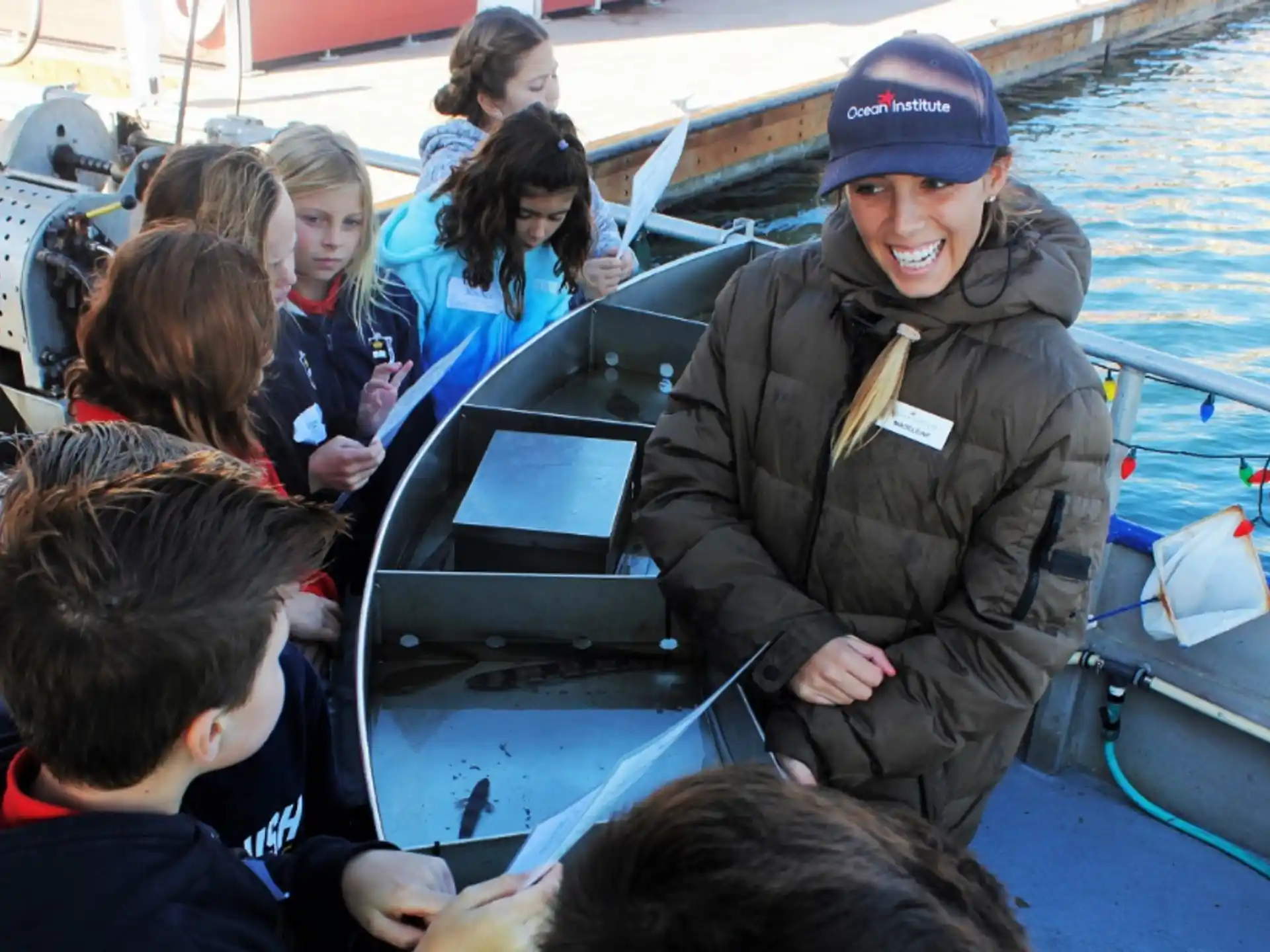 a person in a boat with a group of people on the boat