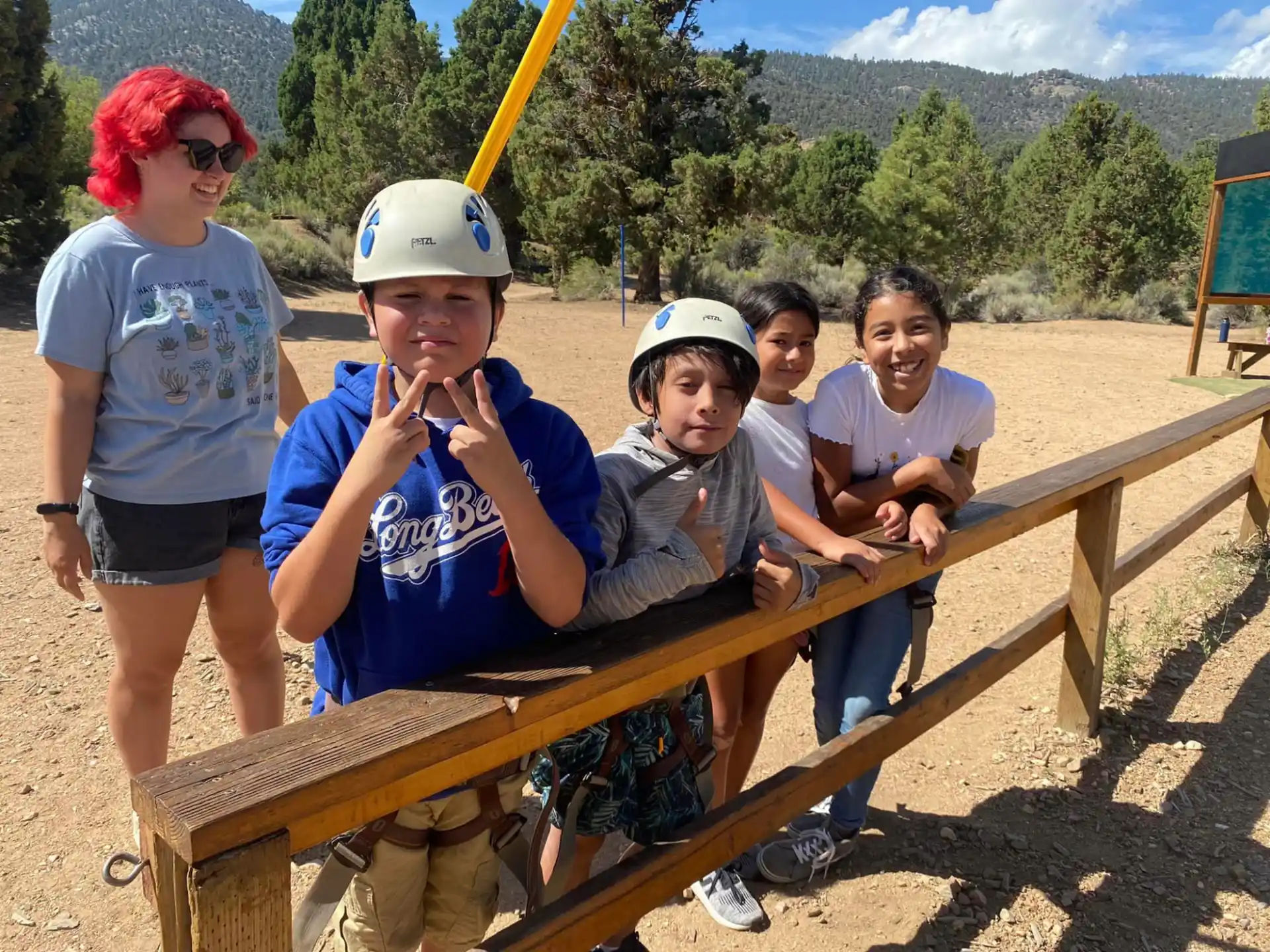 a group of kids posing for a photo
