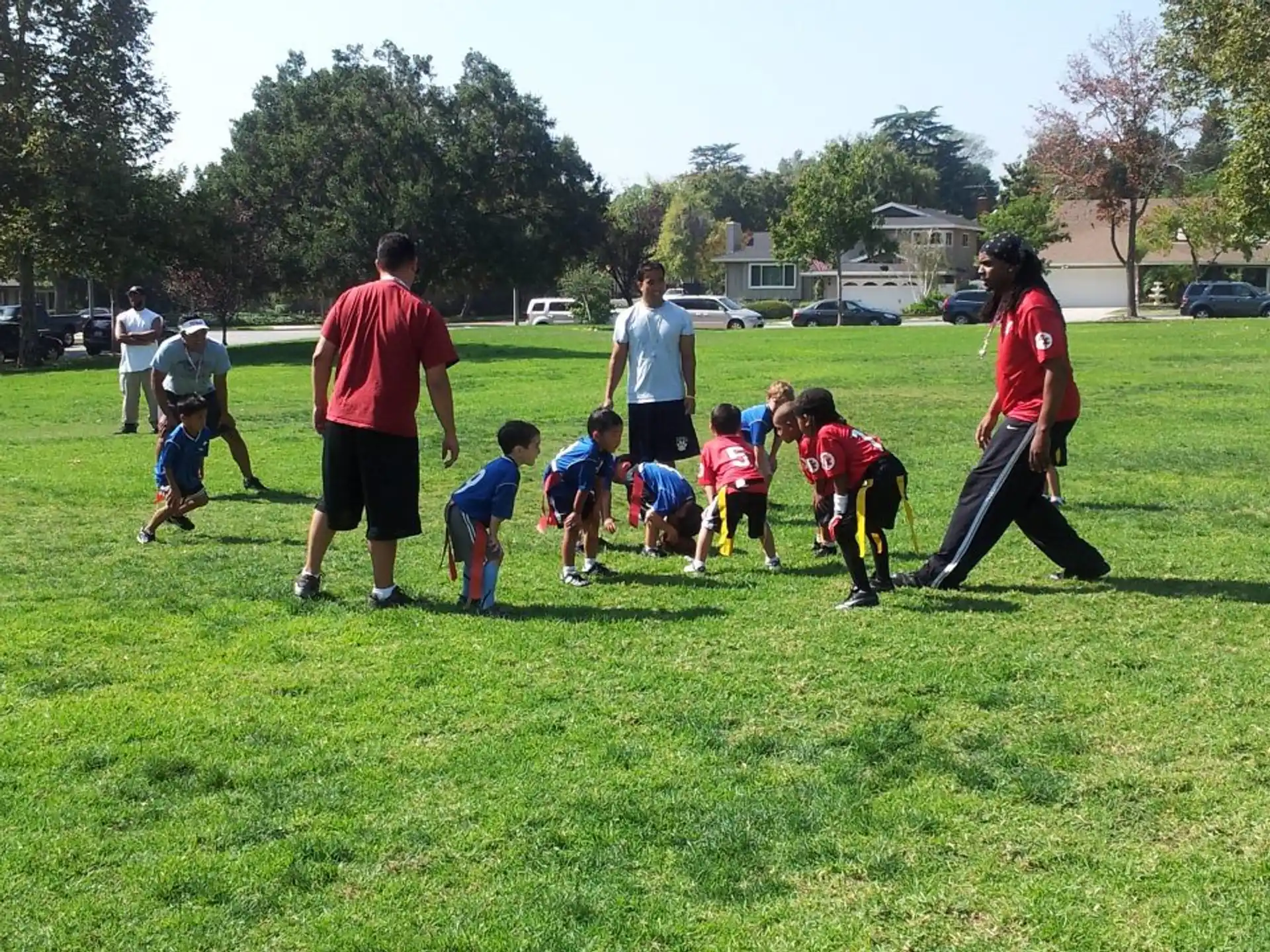 a group of people playing football