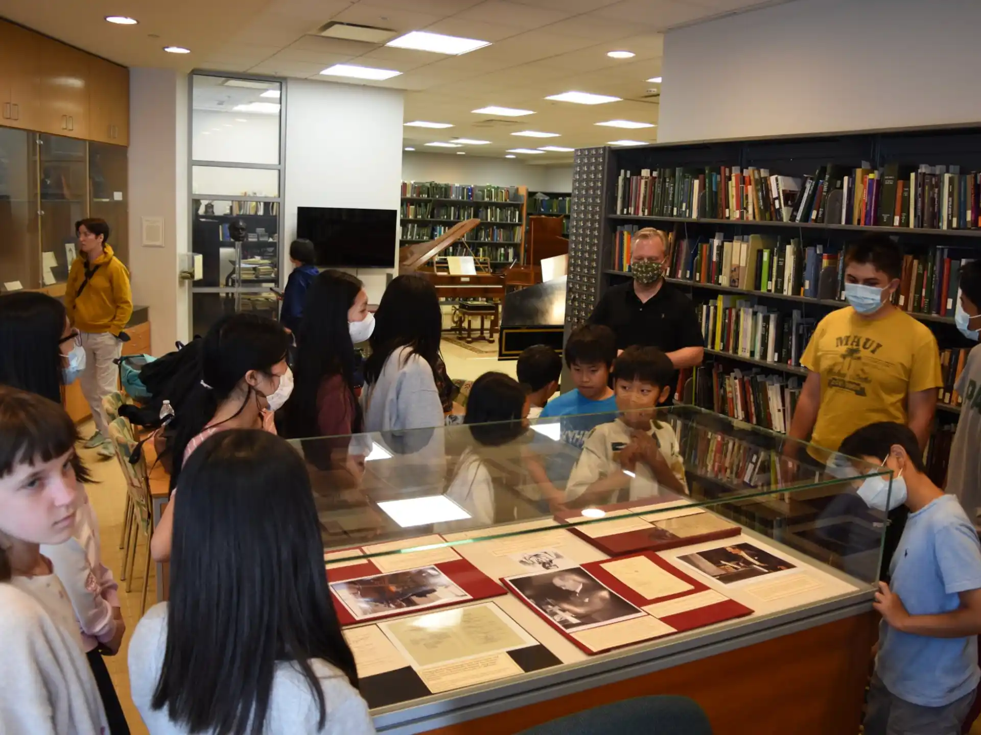 a group of people in a library