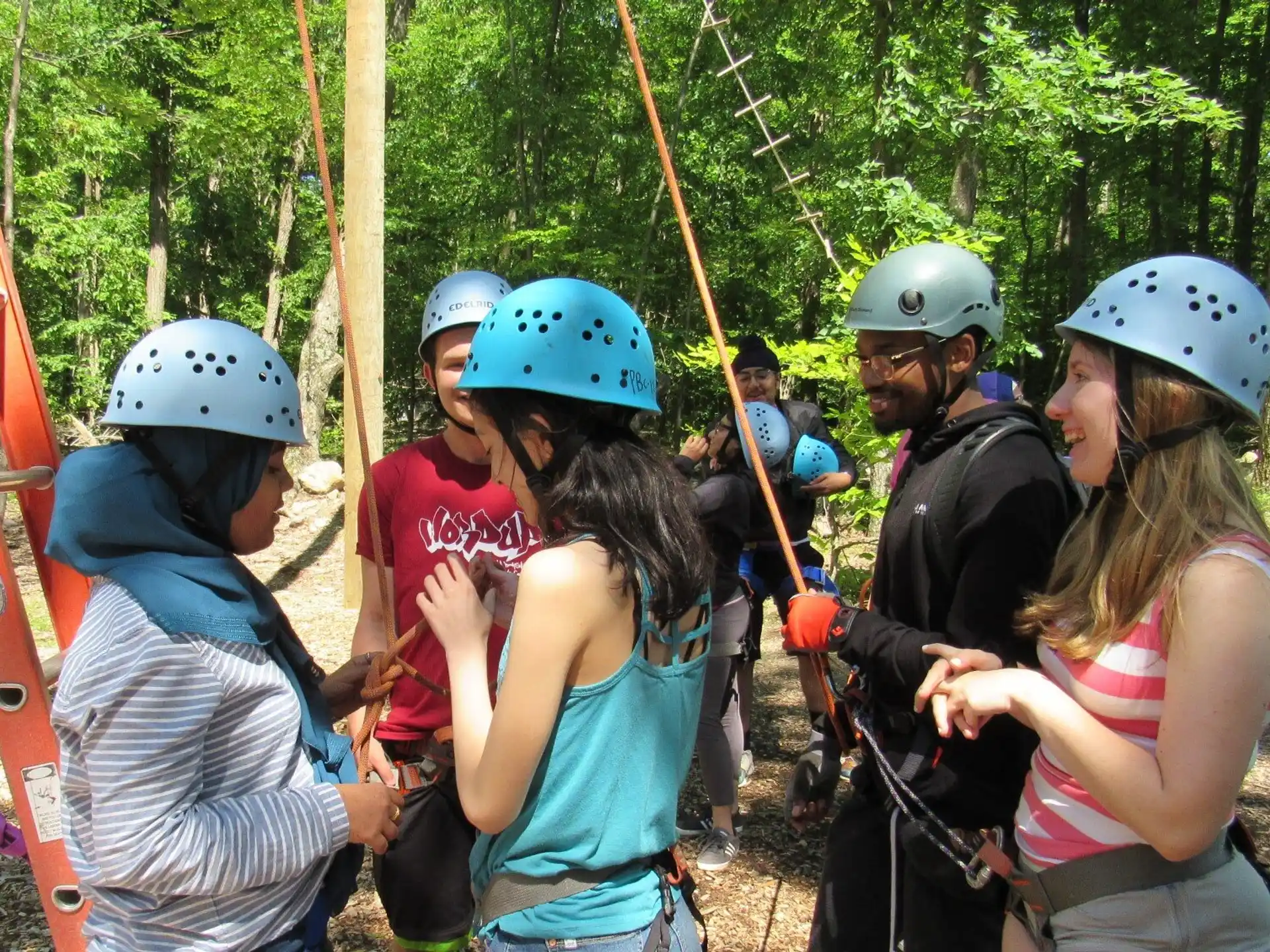a group of people wearing helmets