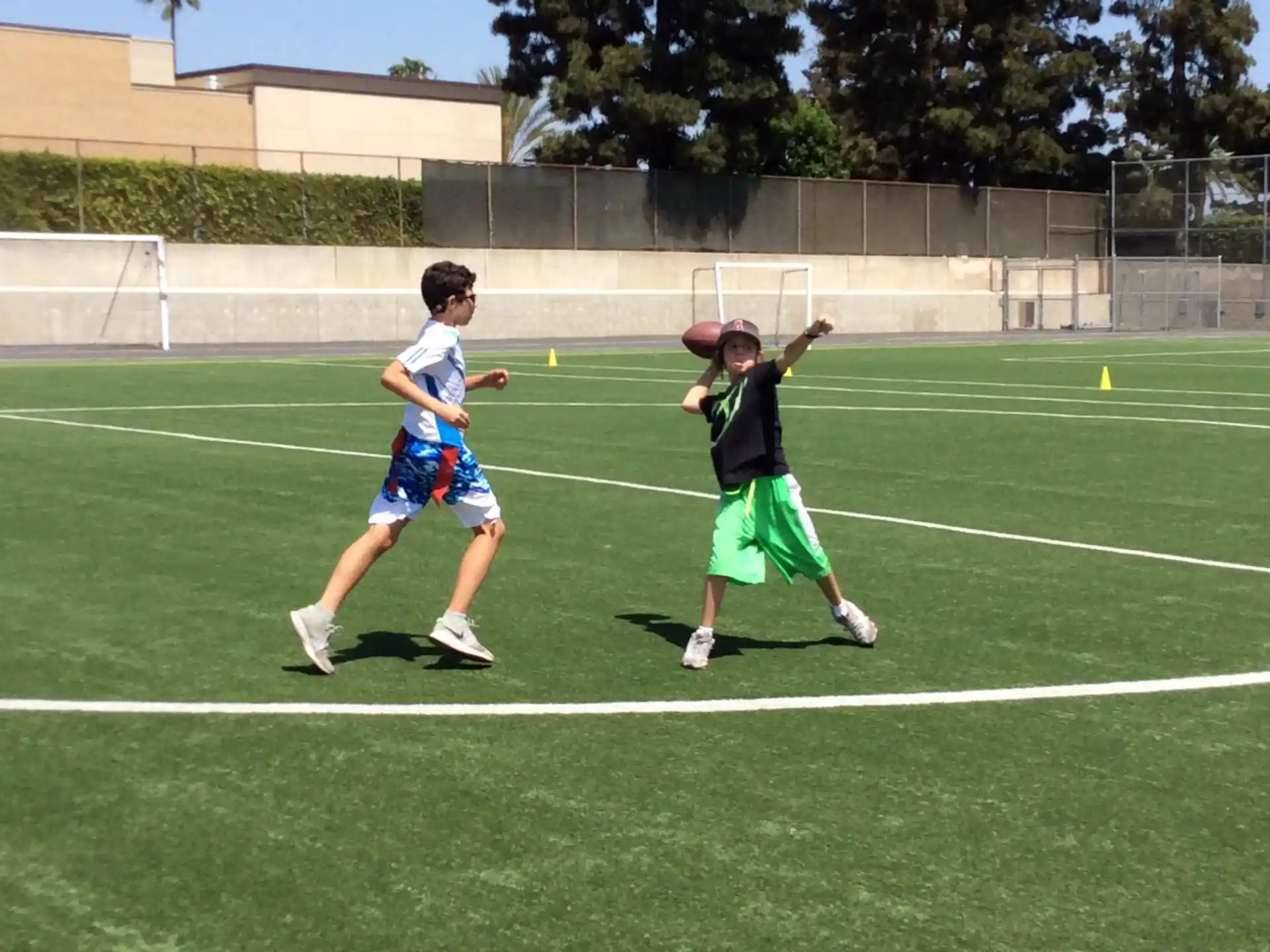 a couple of kids playing football