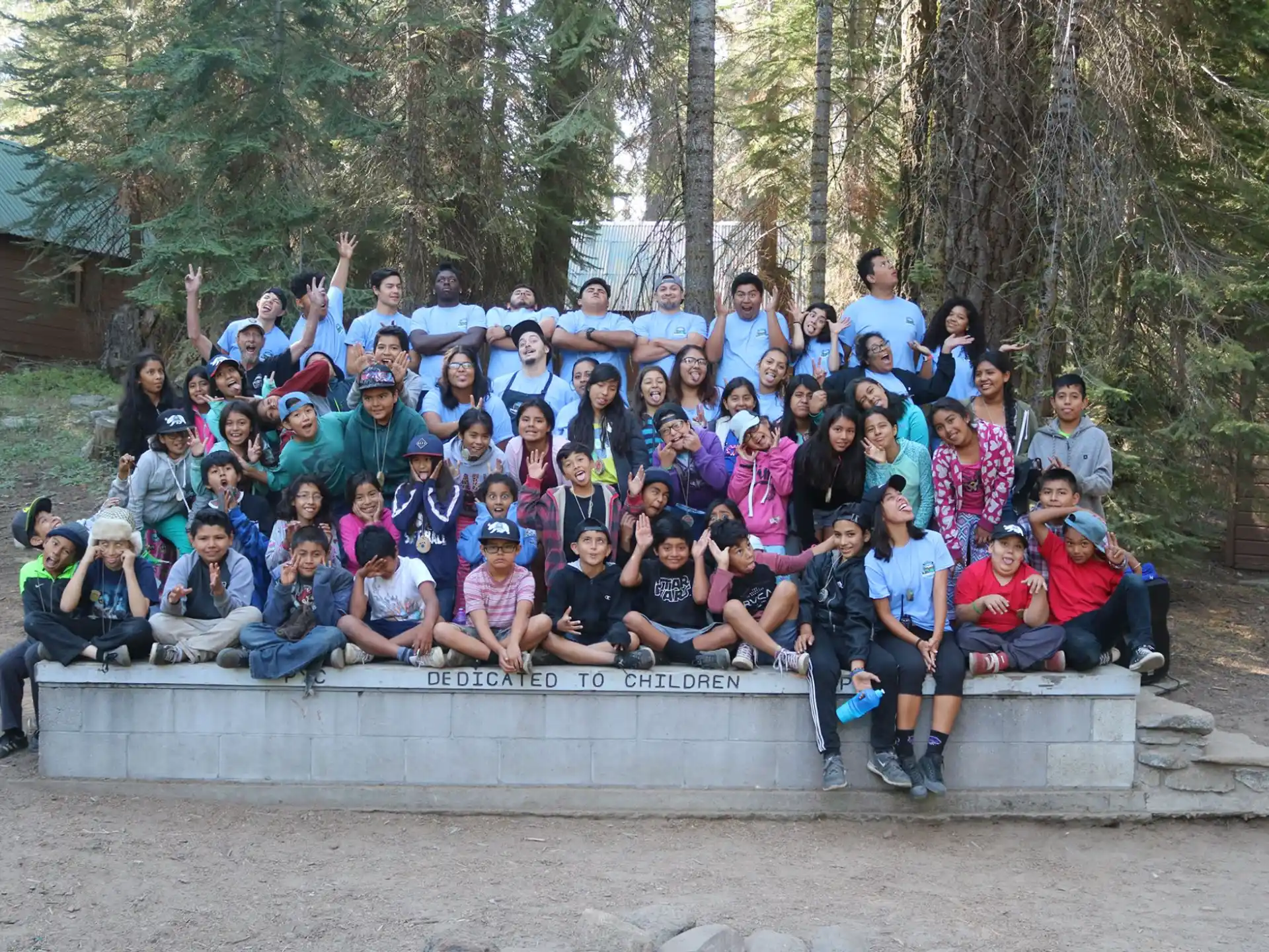 a group of people posing for a photo