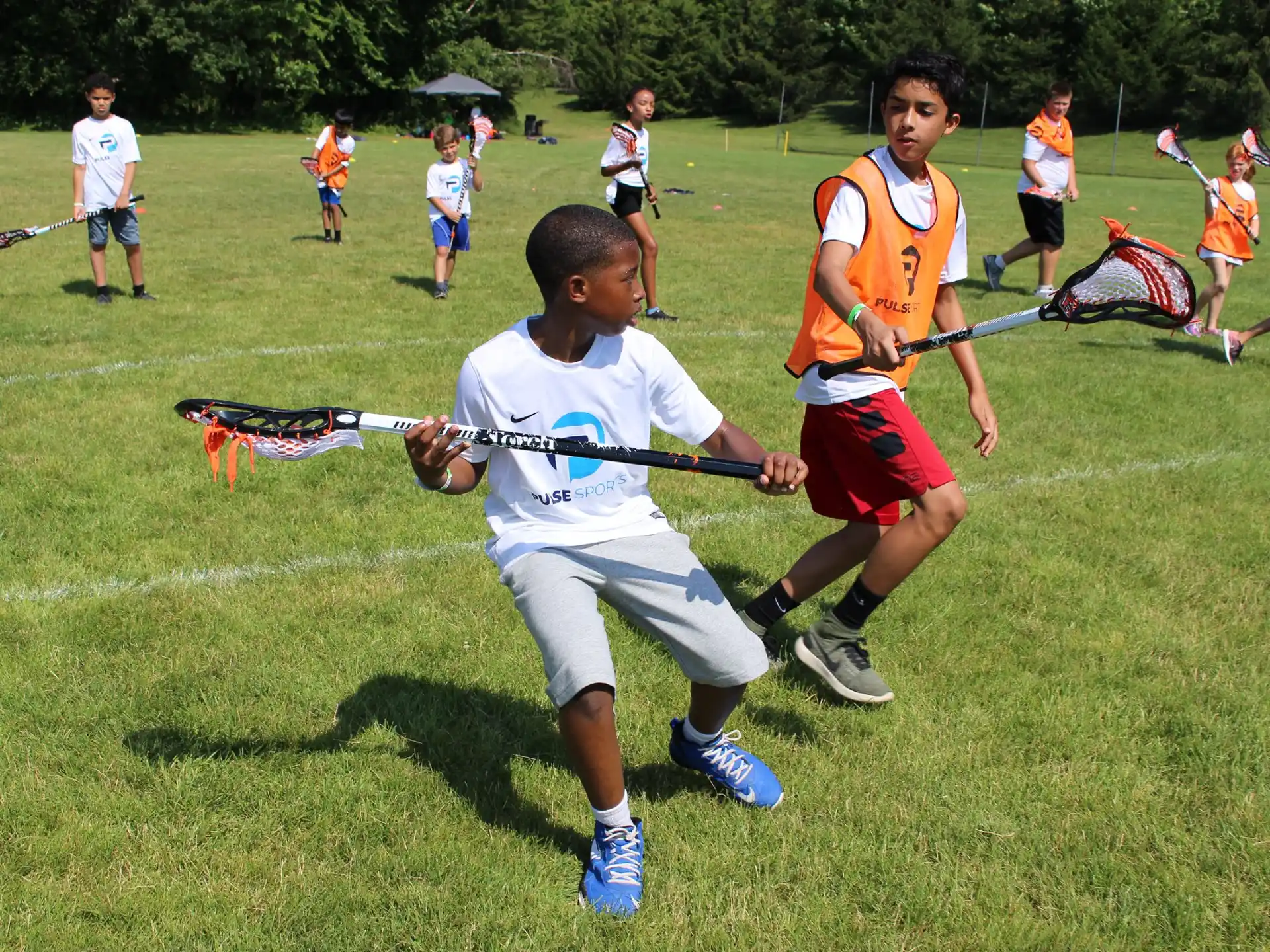 a group of boys playing a sport