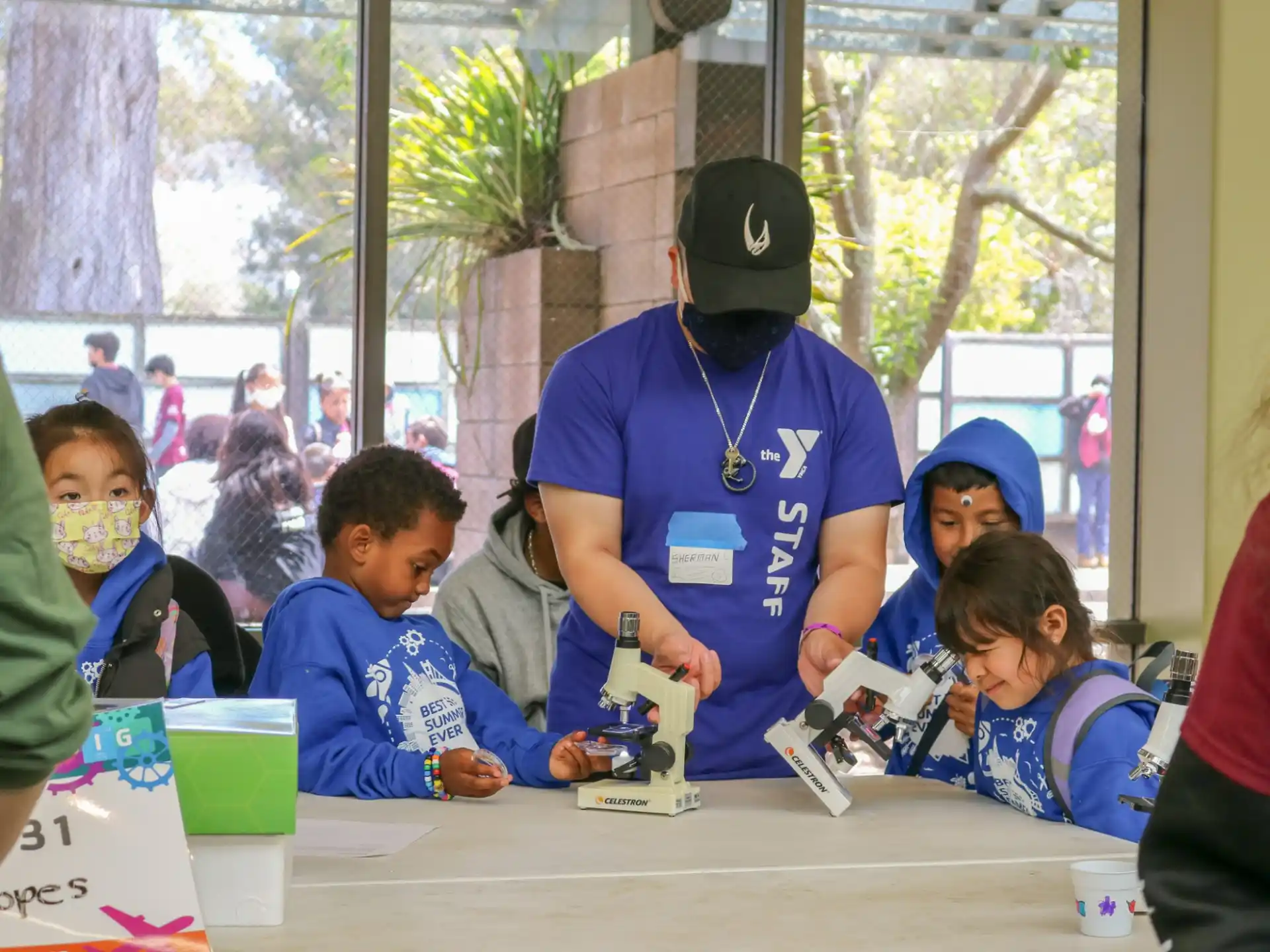 a person and a group of children