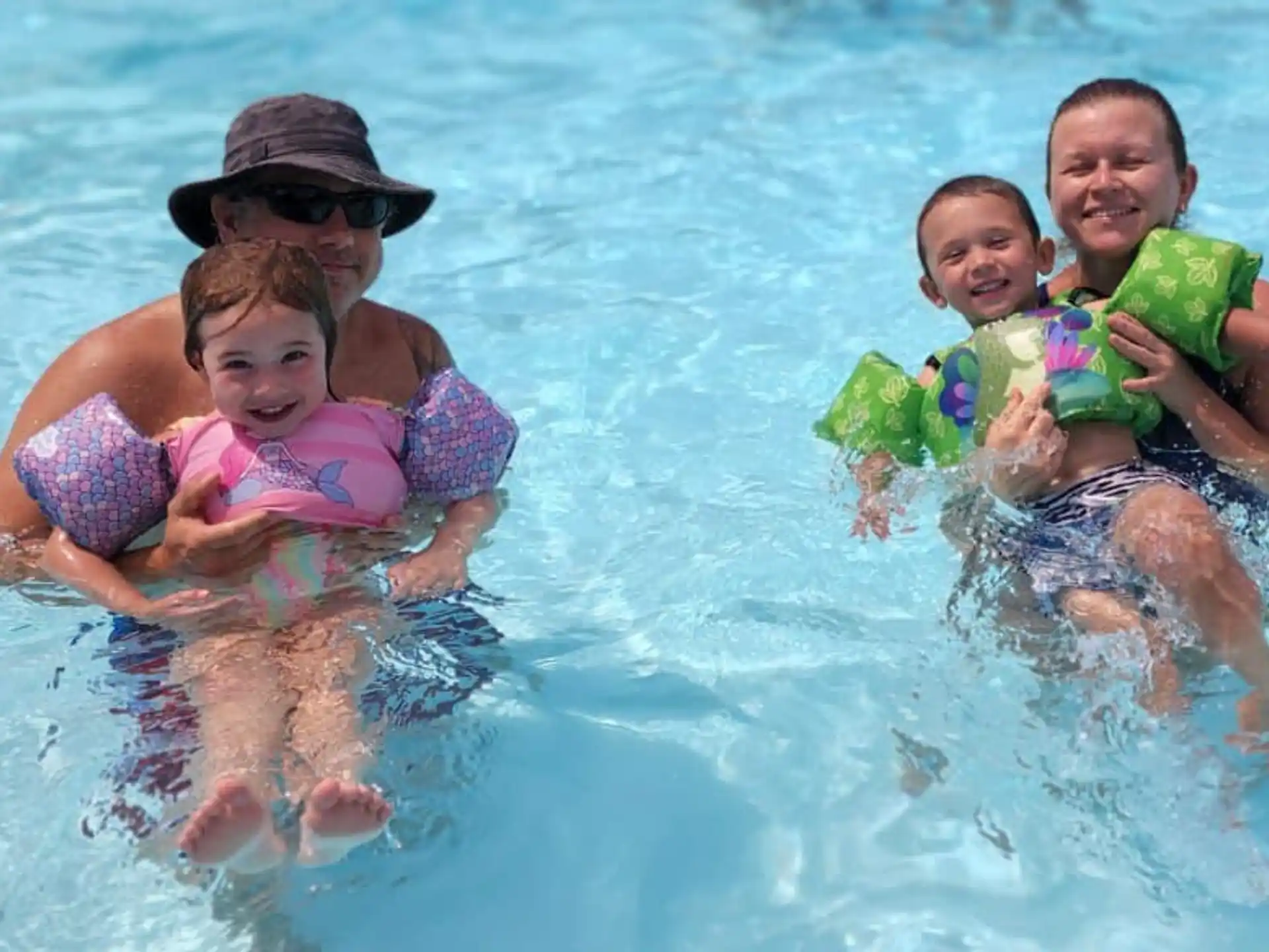 a group of children in the water