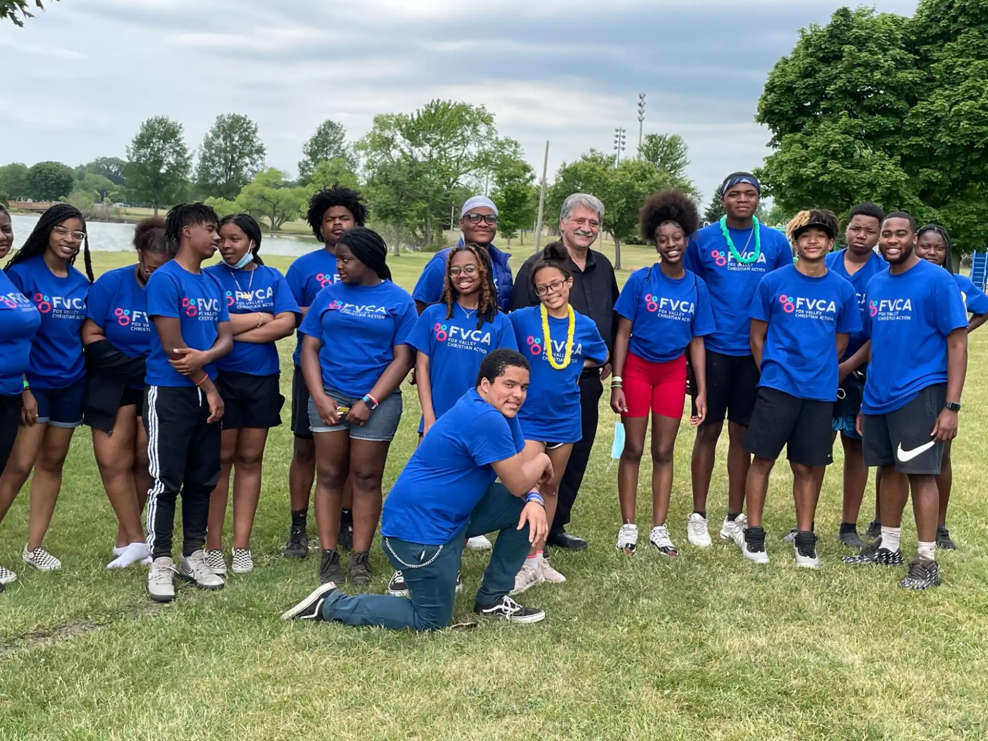 a group of people posing for a photo