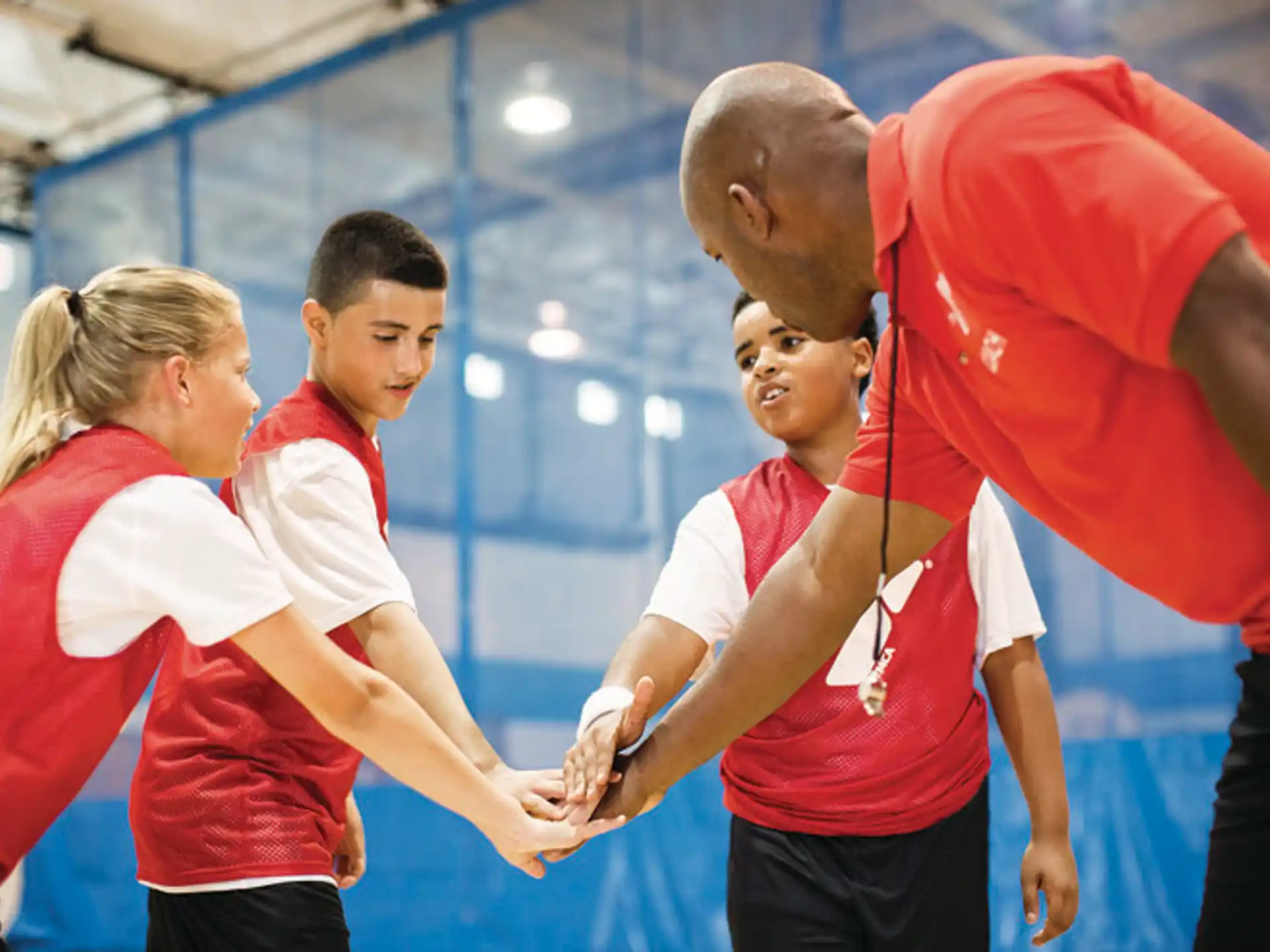 a group of people in a gym