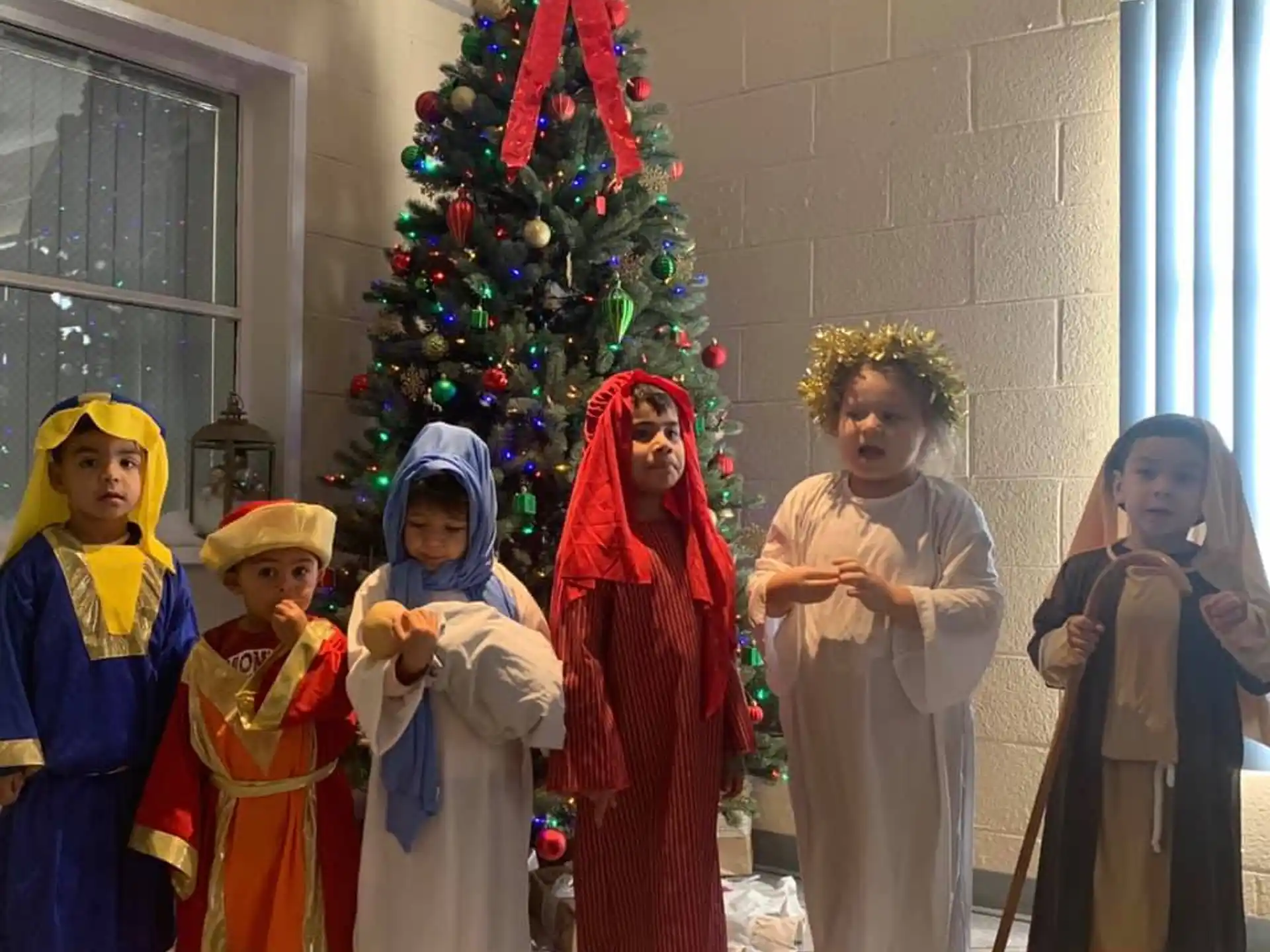 a group of children in clothing