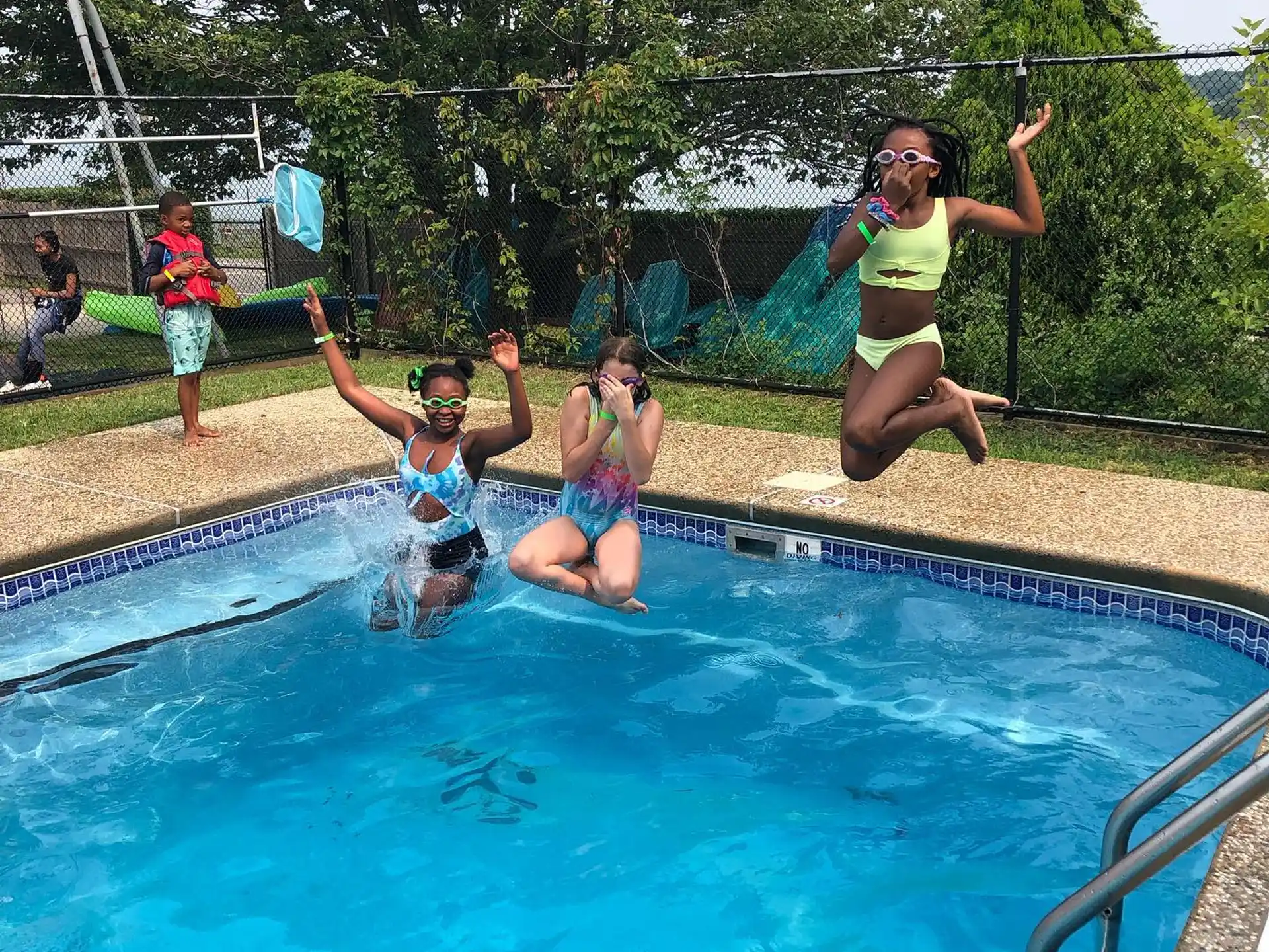 a group of people in a pool