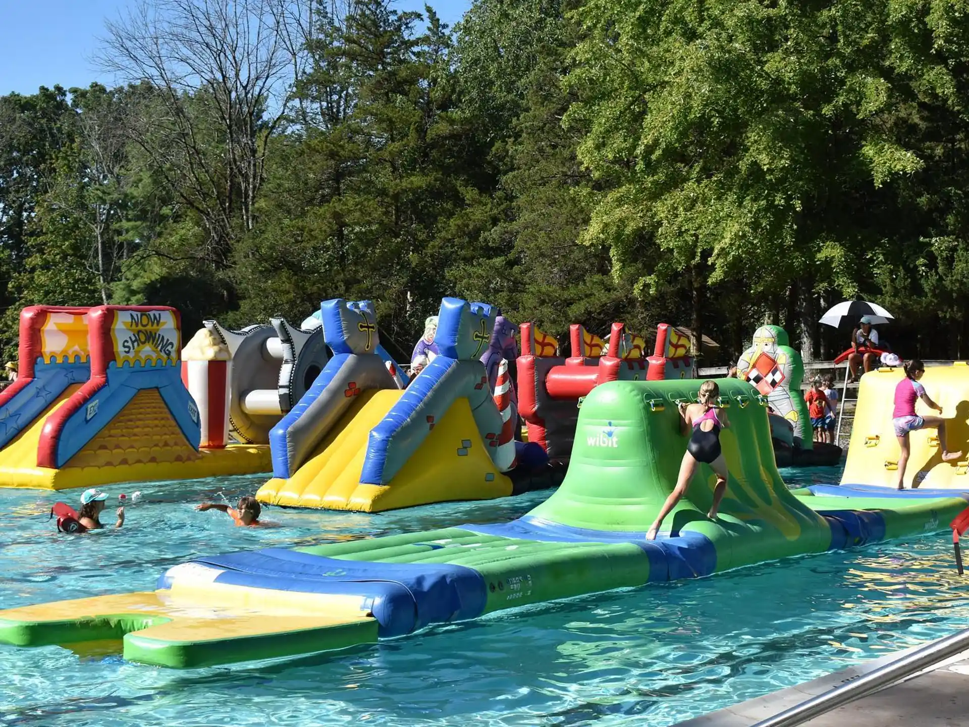 a group of people in a water park