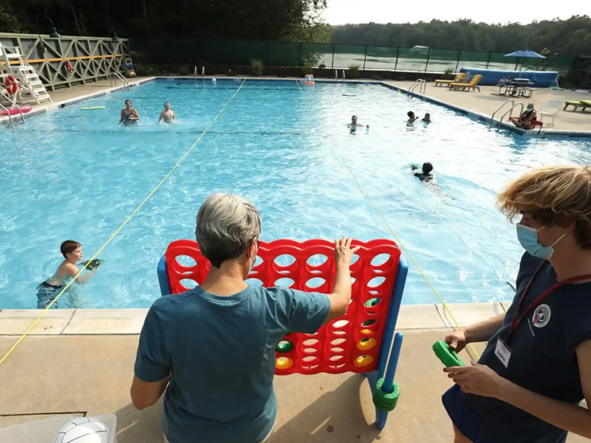 a group of people in a swimming pool