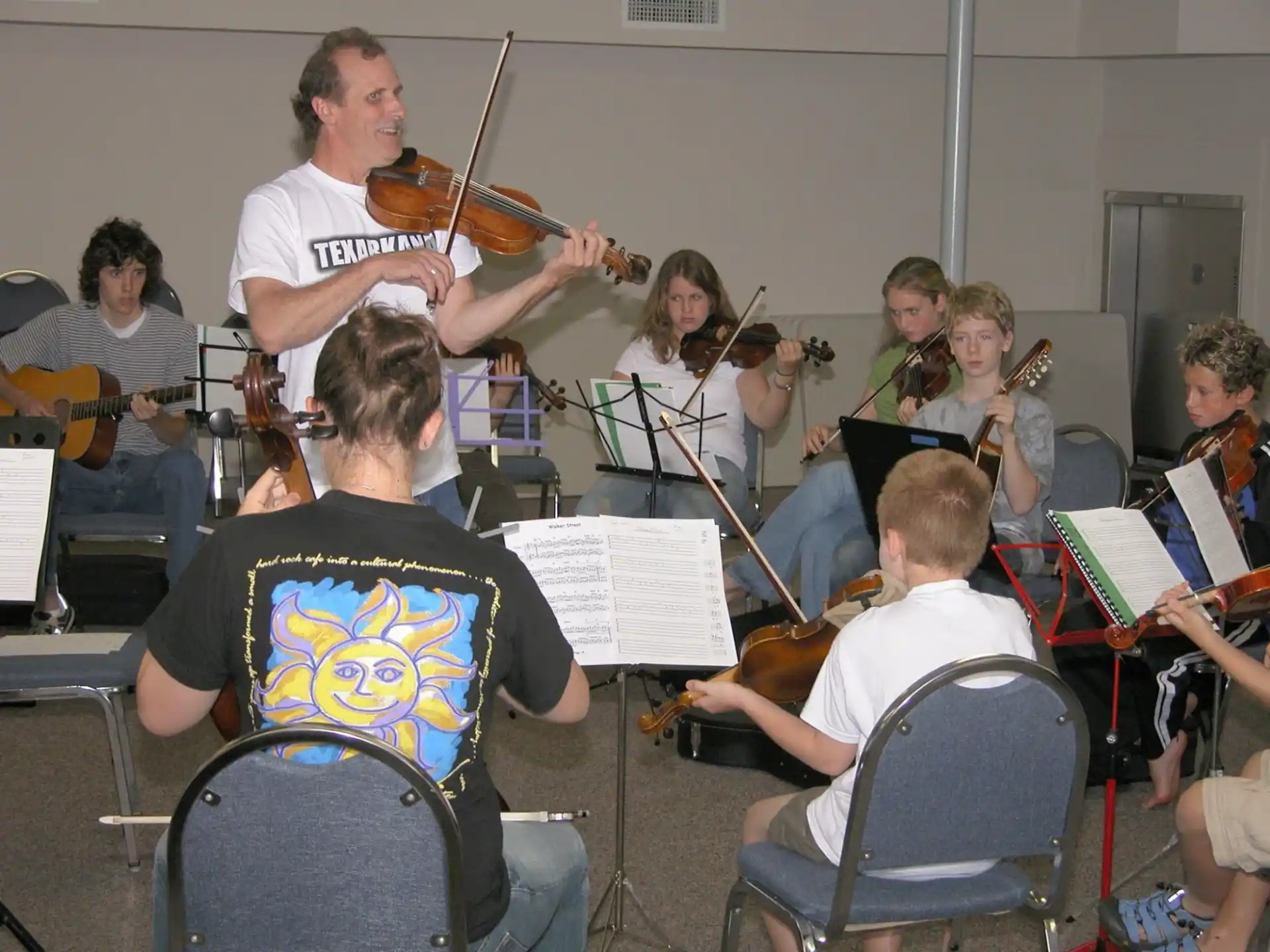 a group of people playing instruments
