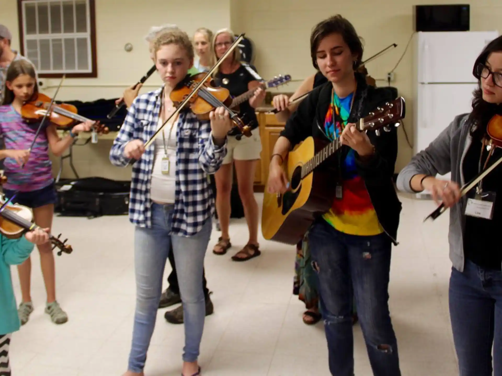 a group of people playing instruments