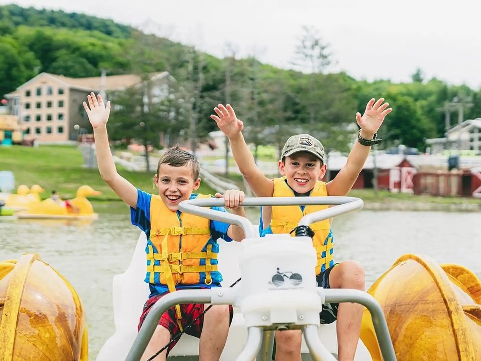 a couple of kids on a boat