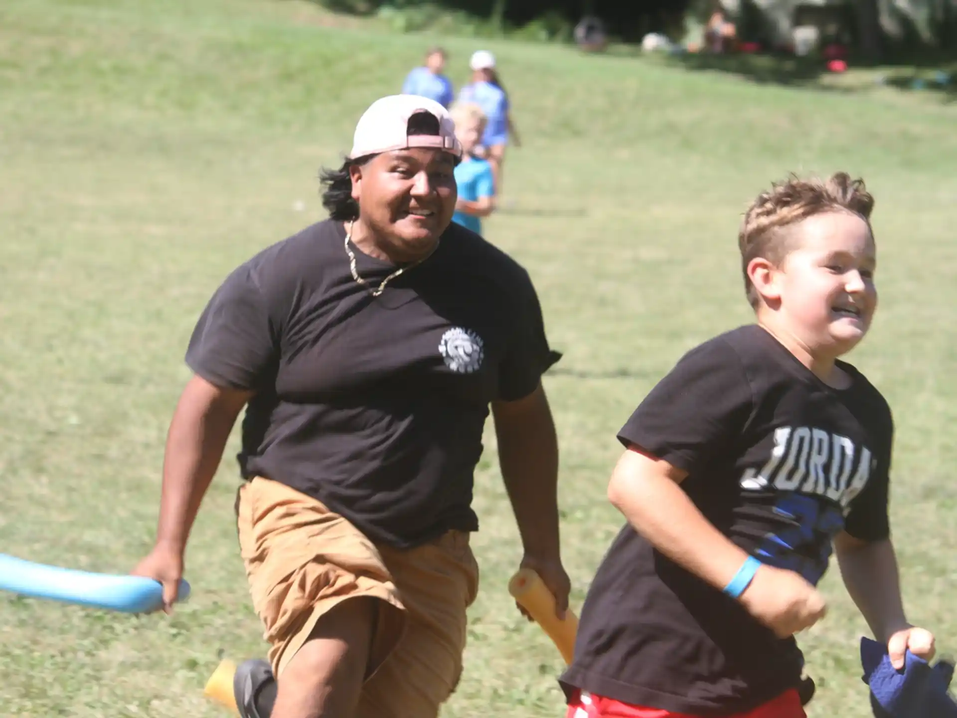 a couple of men playing frisbee
