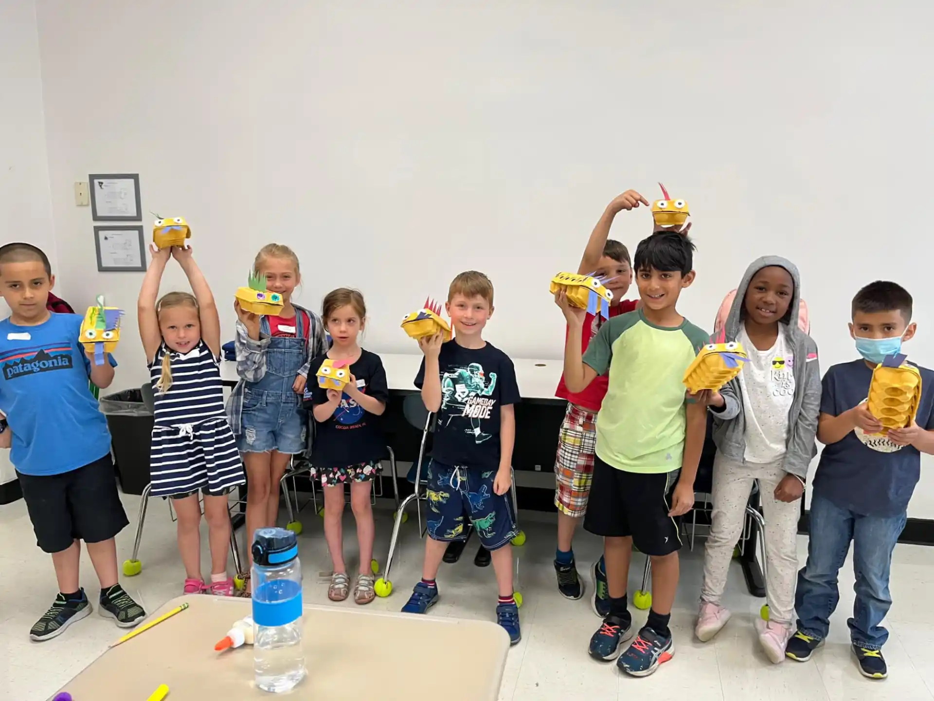 a group of kids holding toys