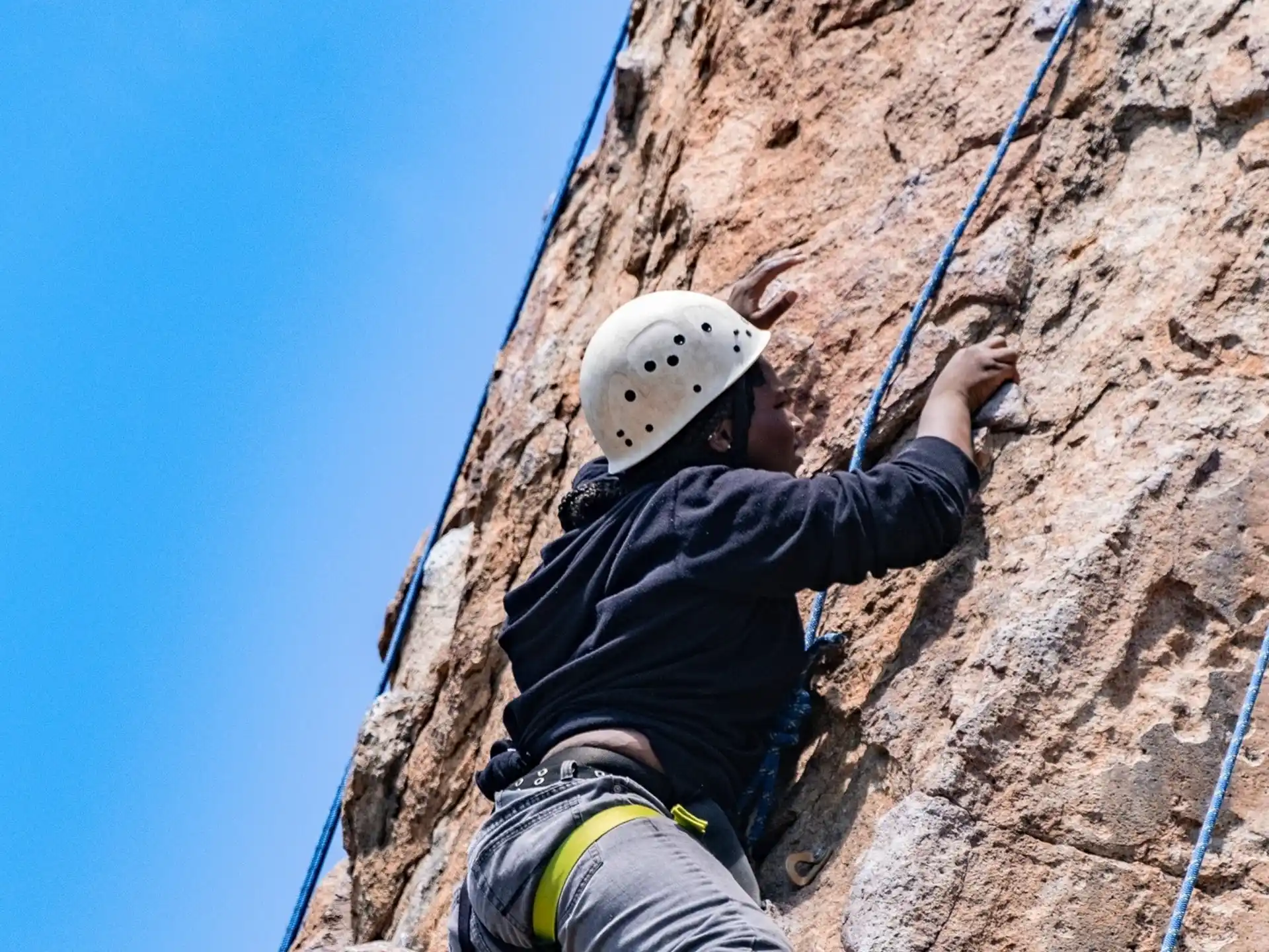 a man rock climbing