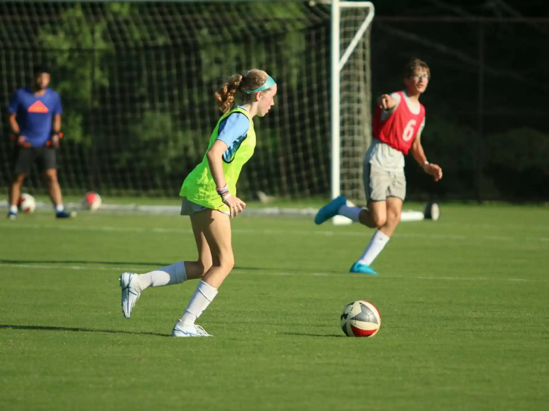 a couple of girls playing football