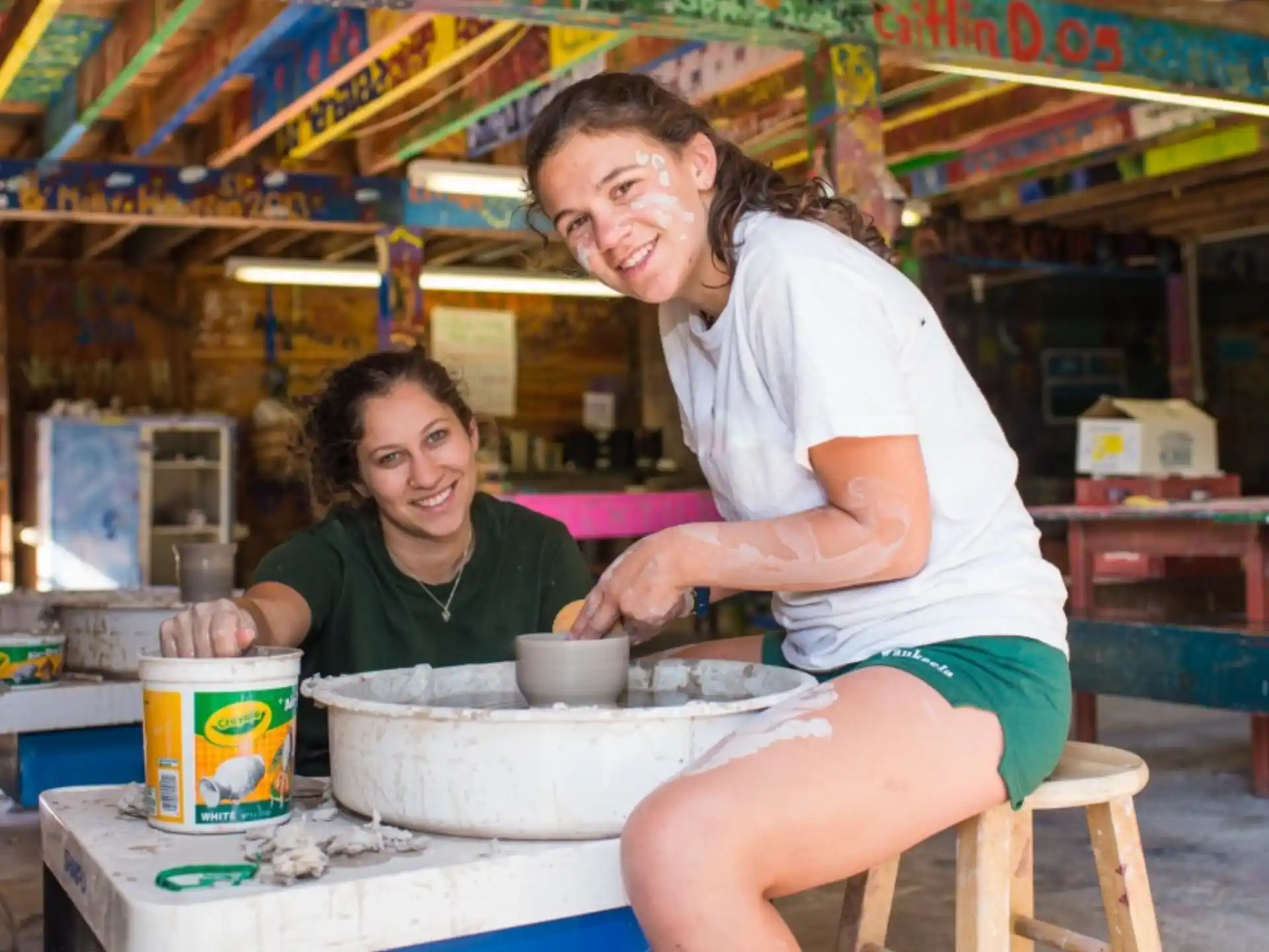 a man and a woman cooking in a kitchen