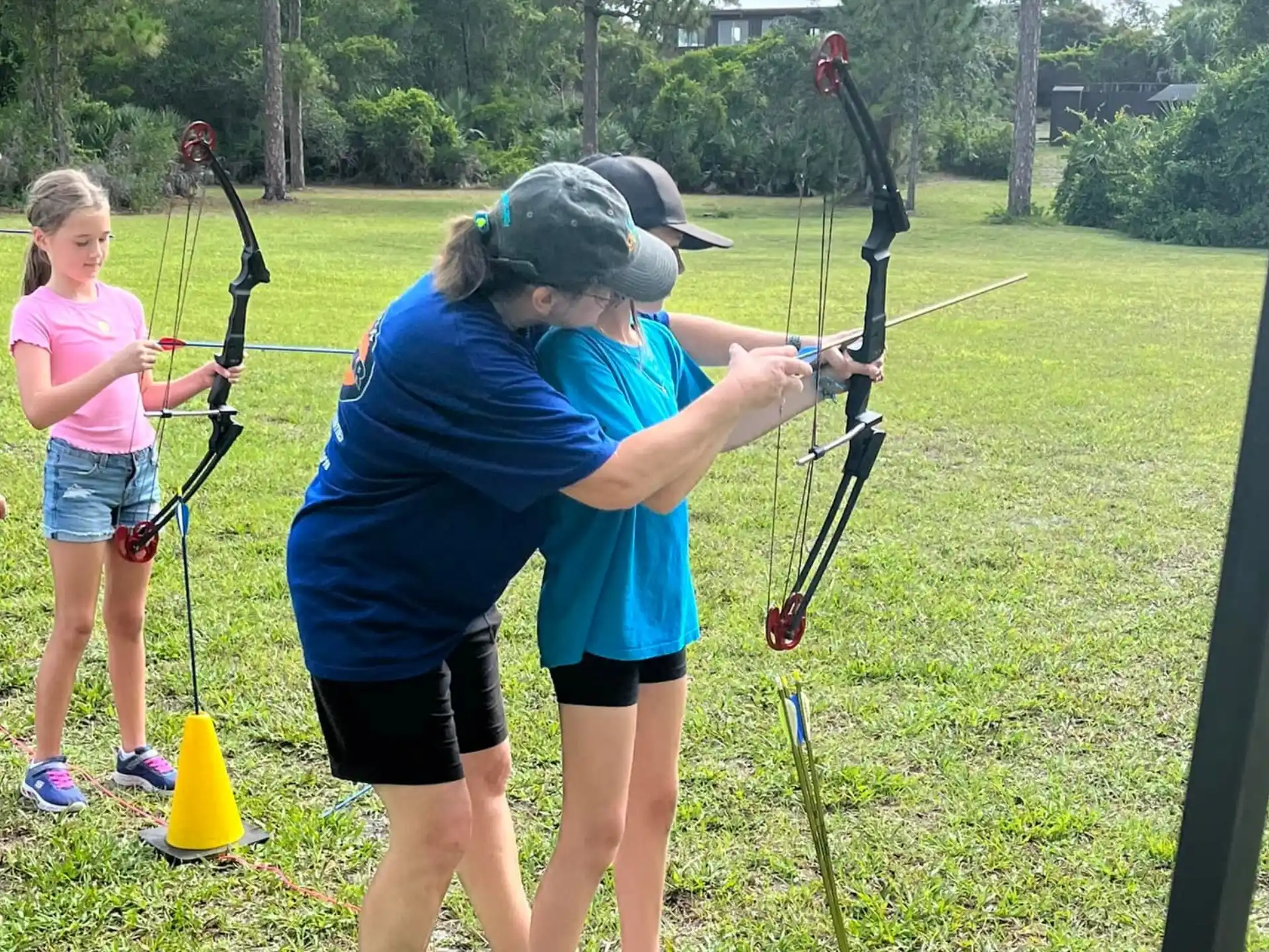 a person shooting a bow and arrow