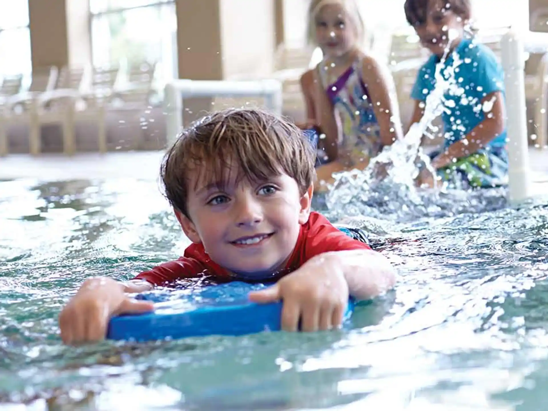 a boy in a pool