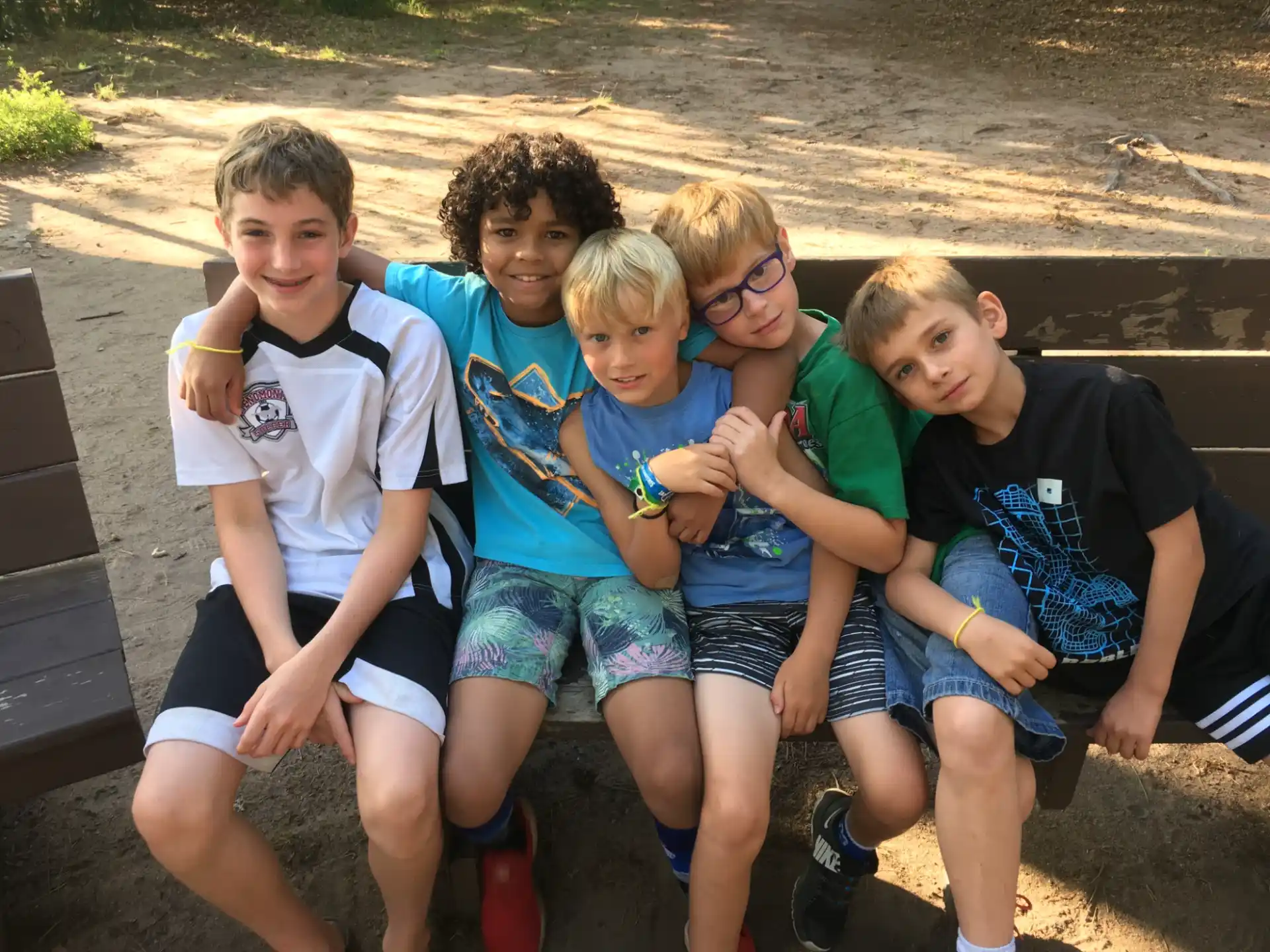 a group of boys posing for a picture