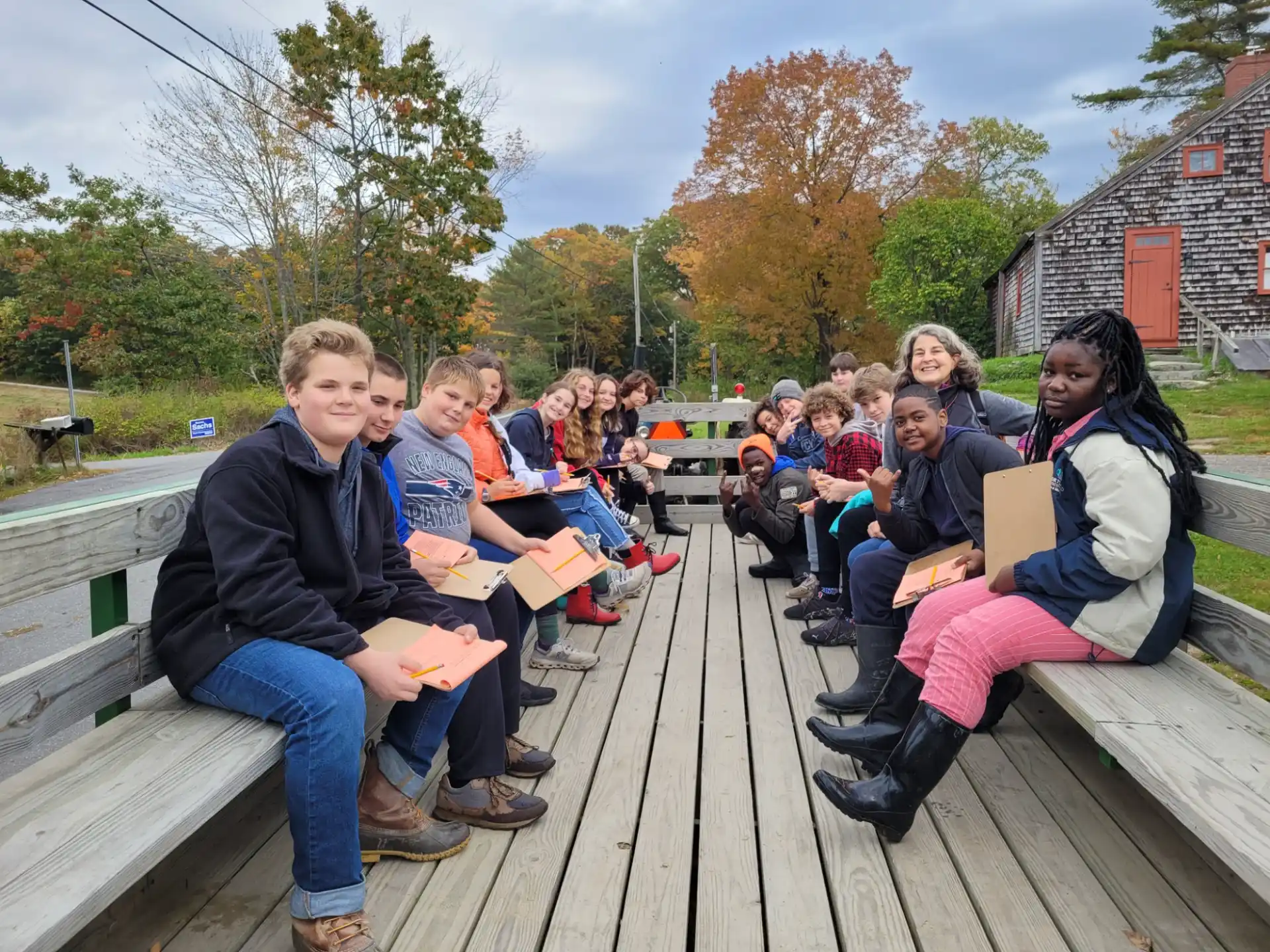 a group of people sitting on a bench