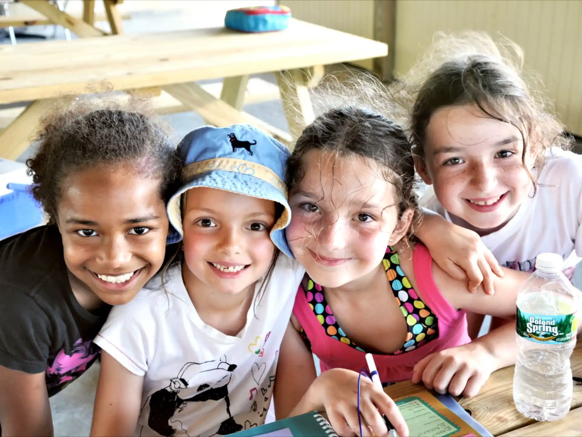 a group of children smiling