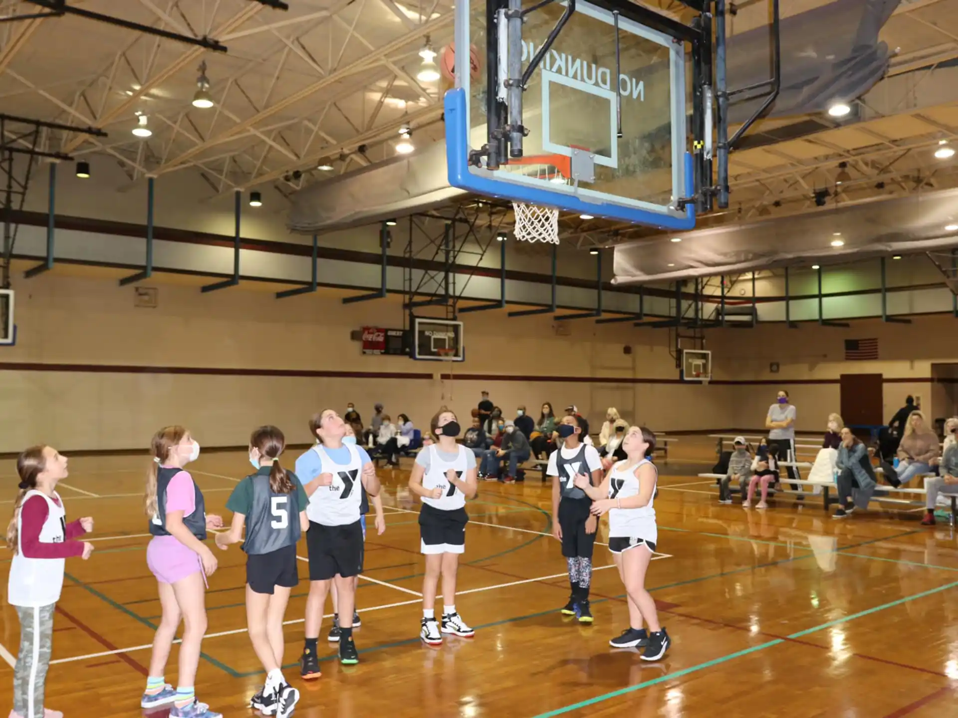 a group of girls in a gym