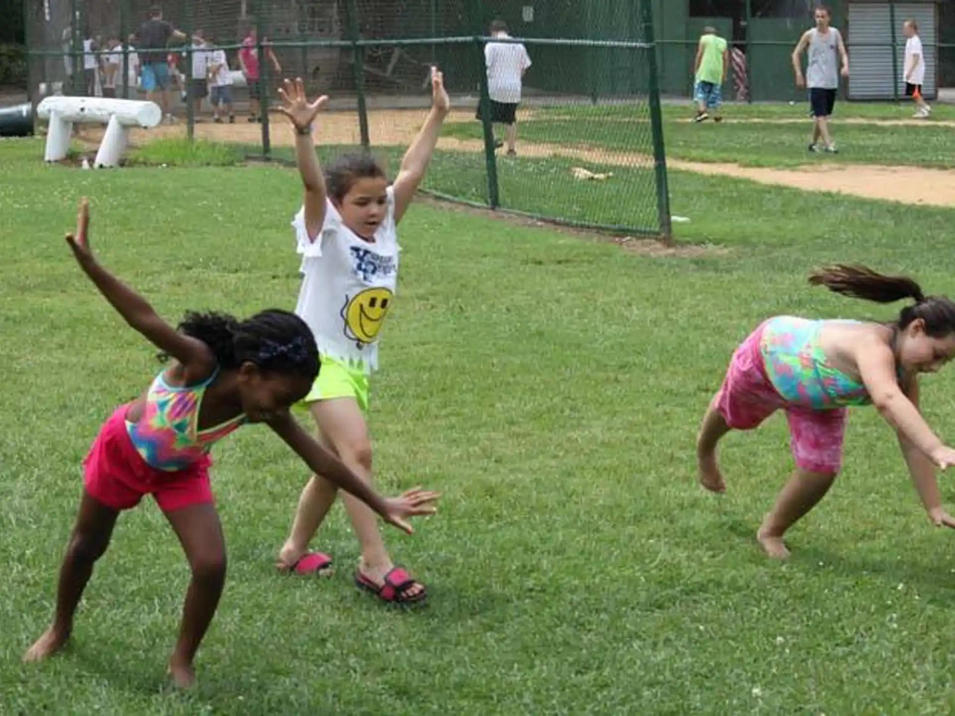 a group of girls jumping in the air